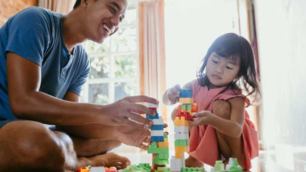 Building a tower out of blocks. 