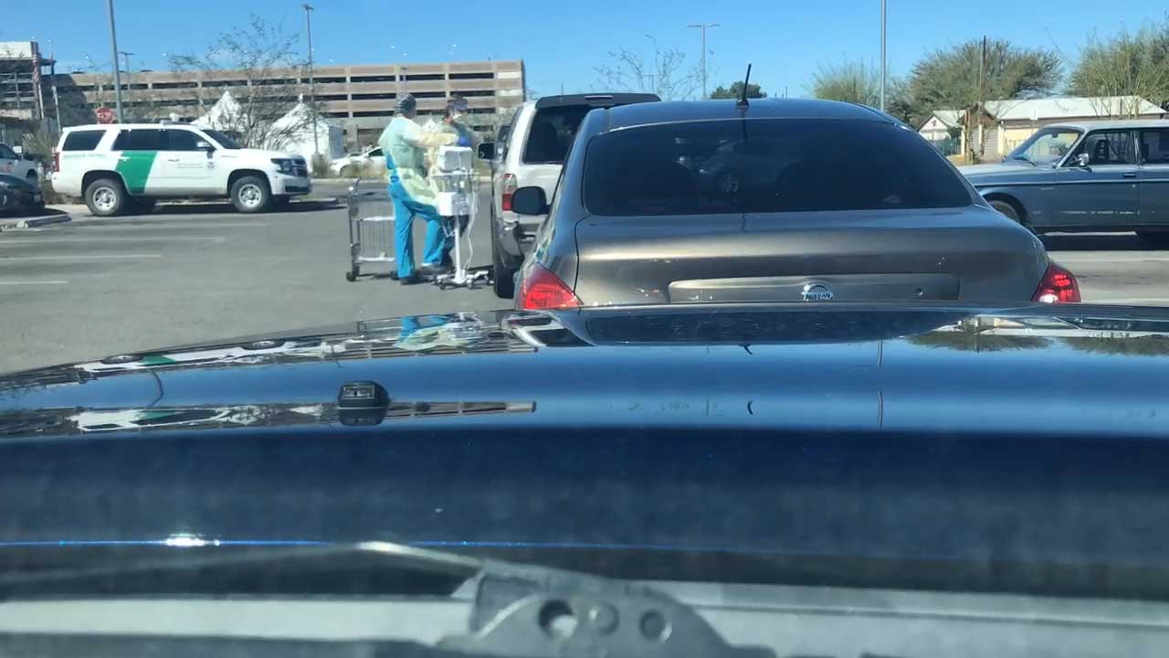 Still image from a video provided by ACLU Arizona. The video shows a parked Customs and Border Protection vehicle at Diamond Children's Medical Center, located at Banner-University Medical Center, which the ACLU says was recorded on March 20.