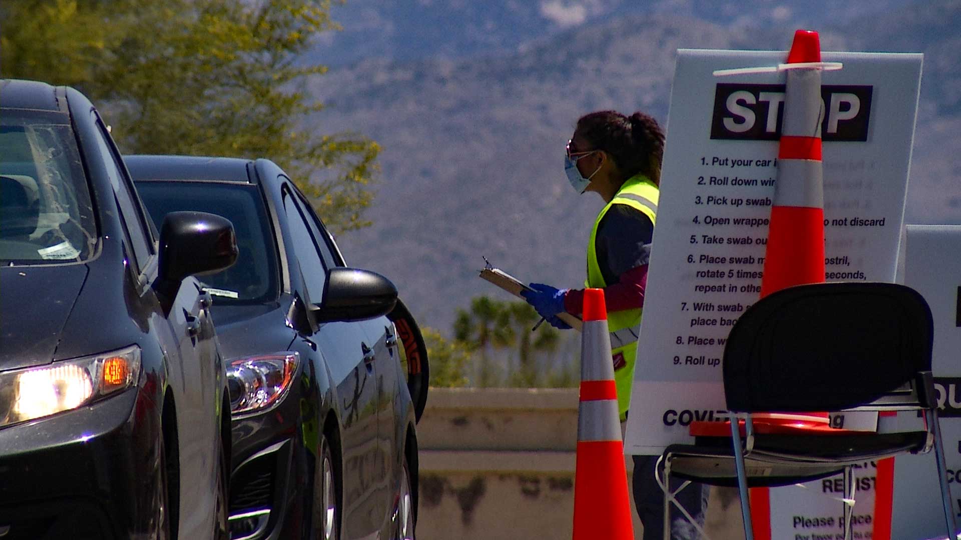 Drivers are screened at a Walgreens COVID-19 testing site in Tucson, April 21. Tucson was chosen as one of 15 locations nationwide for the expansion of drive-thru testing sites by Walgreens.