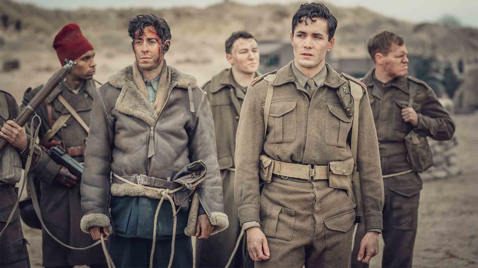 Shown from left to right: Matthew Romain (as Geoff) and Jonah Hauer-King (as Harry Chase)