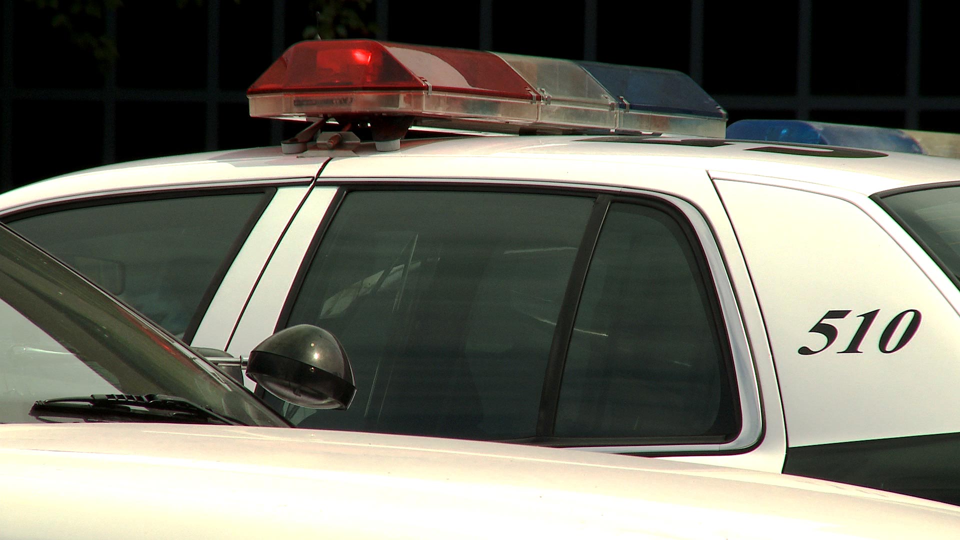 Lights mounted on the tops of Tucson Police cruisers in a parking lot outside of the department's headquarters. 