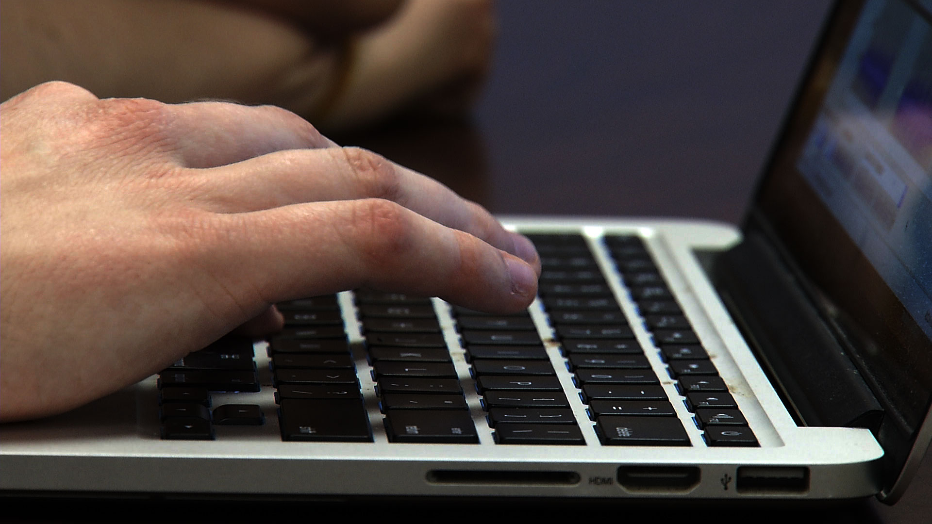 A student works on a laptop at University High School in Tucson, March 2019. 