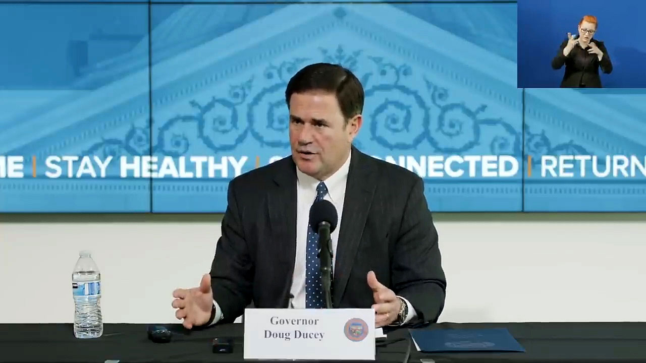 Arizona Governor Doug Ducey updates the media about the state's COVID-19 pandemic response at a news conference in Phoenix on April 27, 2020. 