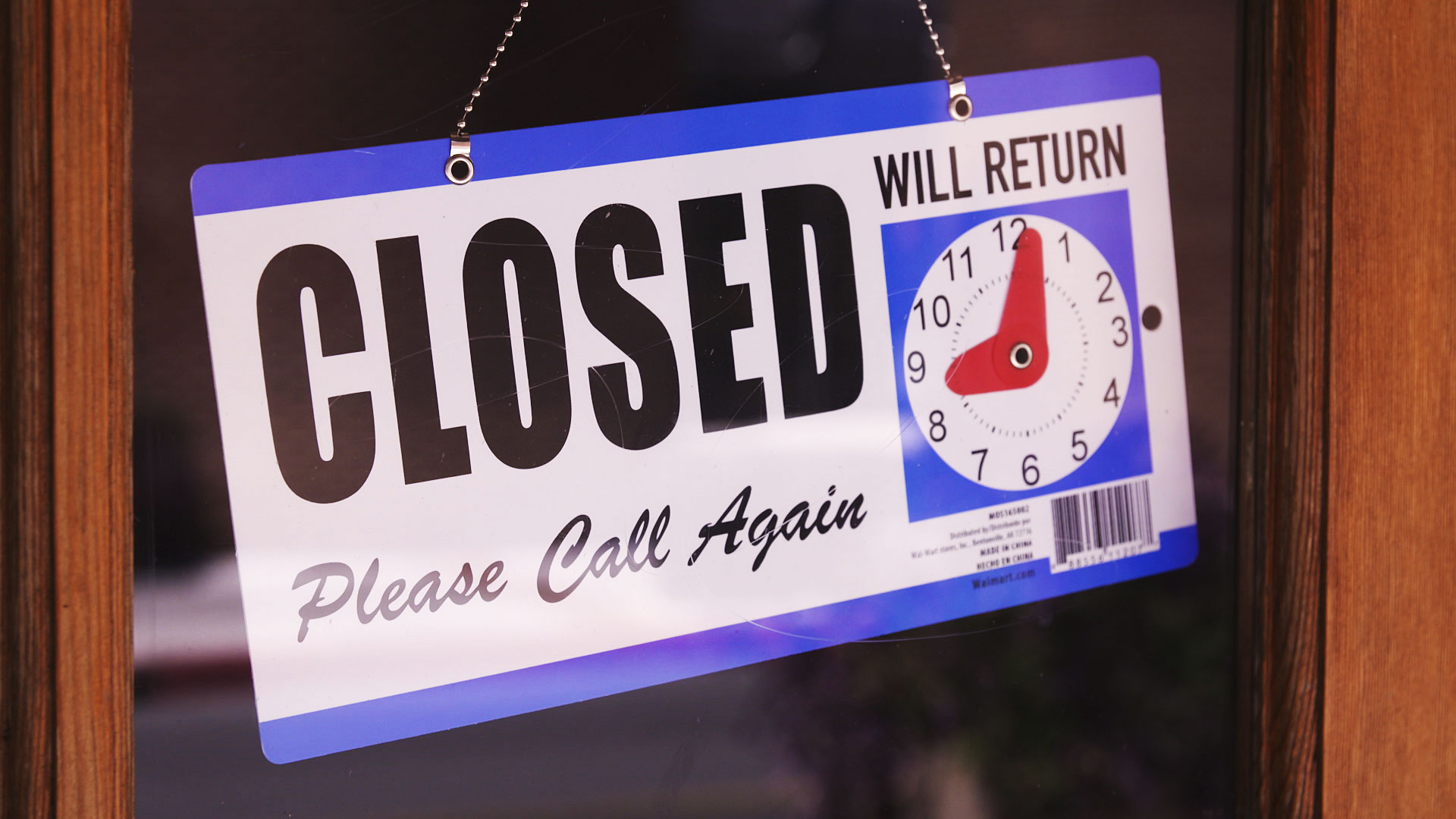A closed sign at the entrance of English Salon Spa in downtown Tucson on April 26, 2020. The salon closed as it was required by Arizona's stay at home order during the COVID-19 pandemic. 