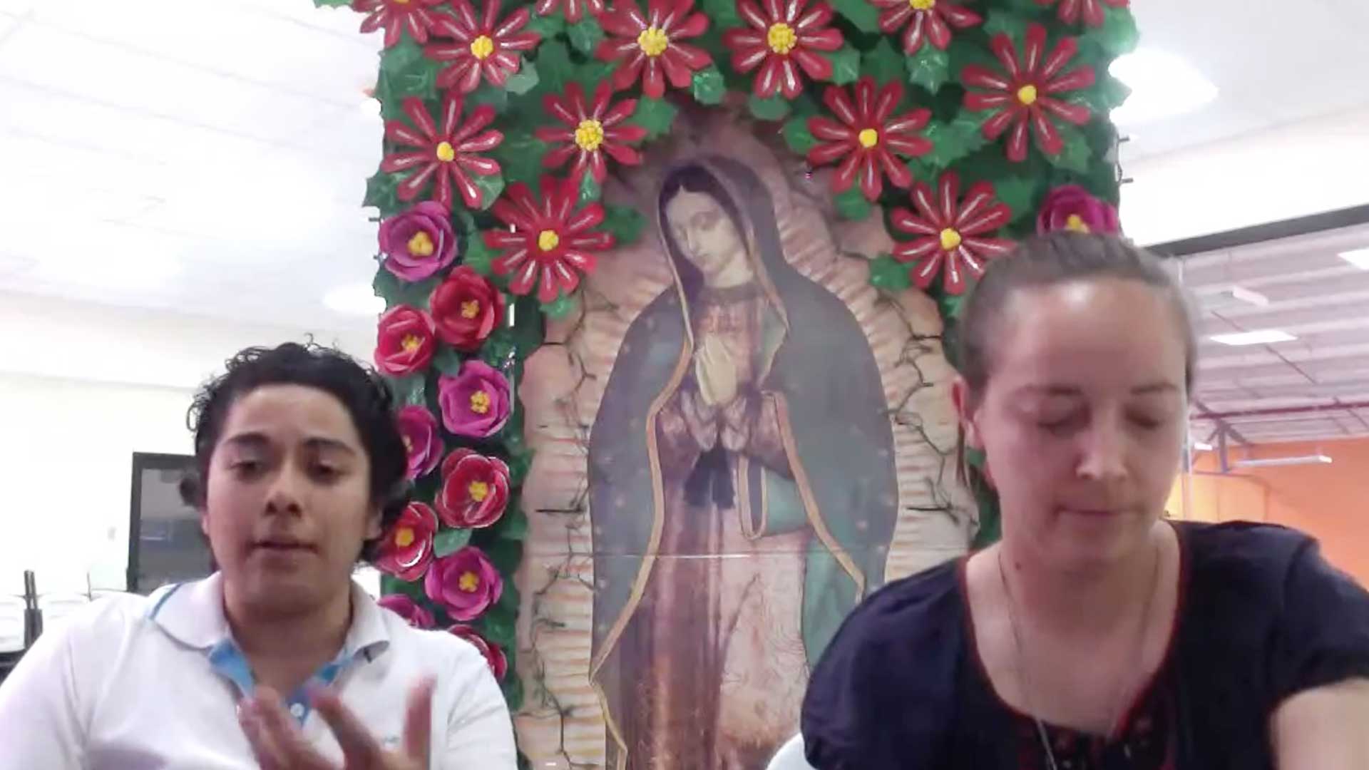 Kino Border Initiative staffers Josefina Bejarano Padilla and Tracy Hogan read messages sent from across the country for Mother's Day, in this still image from the shelter's Facebook Live event.