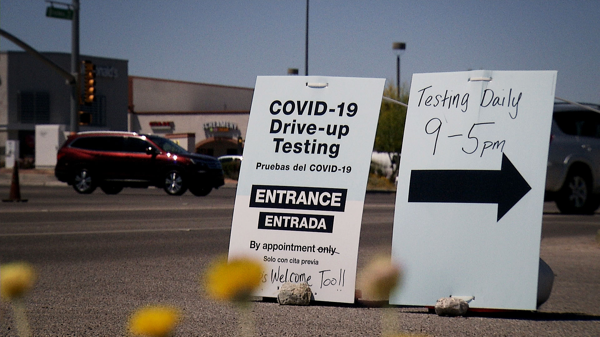 Signs advertise a drive-thru COVID-19 testing site outside of Walgreens in Tucson on April 21, 2020. 