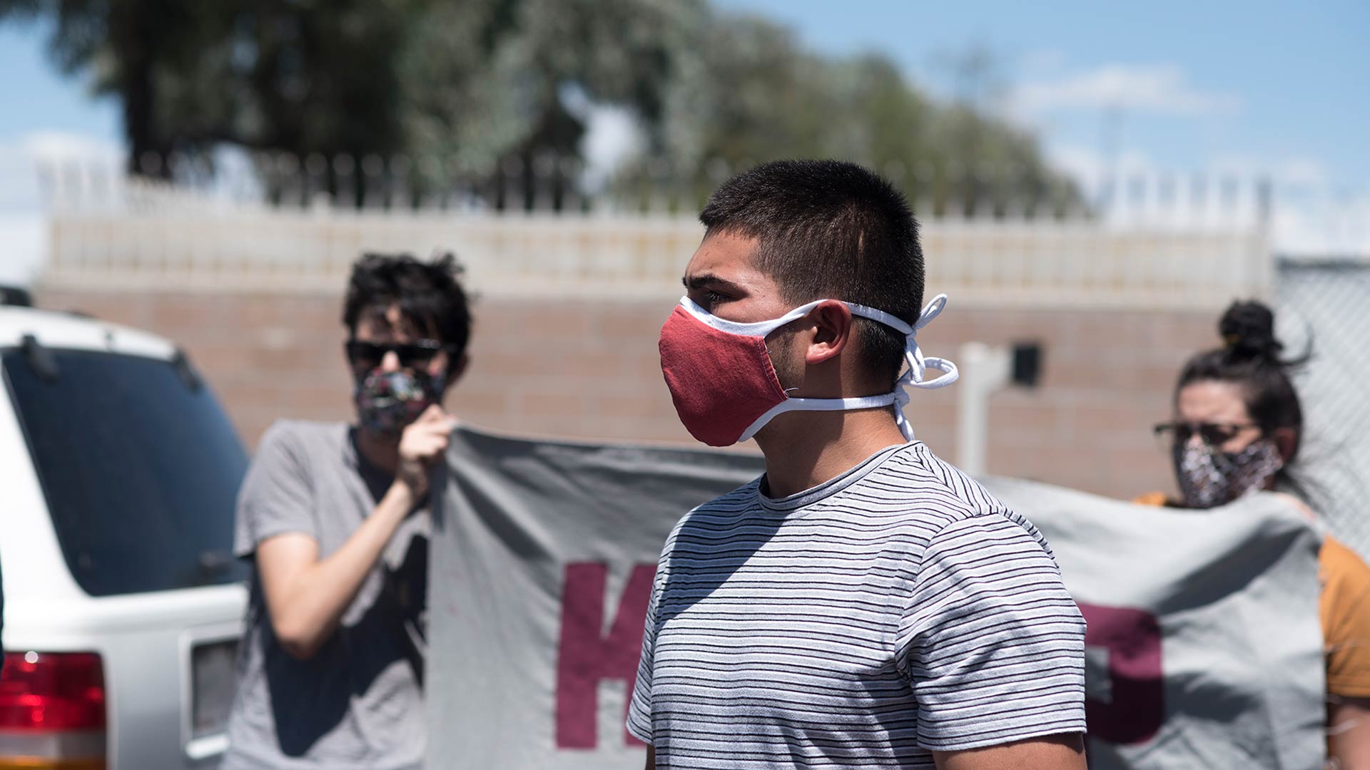 Brayann Lucero, 19, is greeted by community members and journalists after leaving an Immigration and Customs Enforcement field office in Tucson on June 16, 2020.