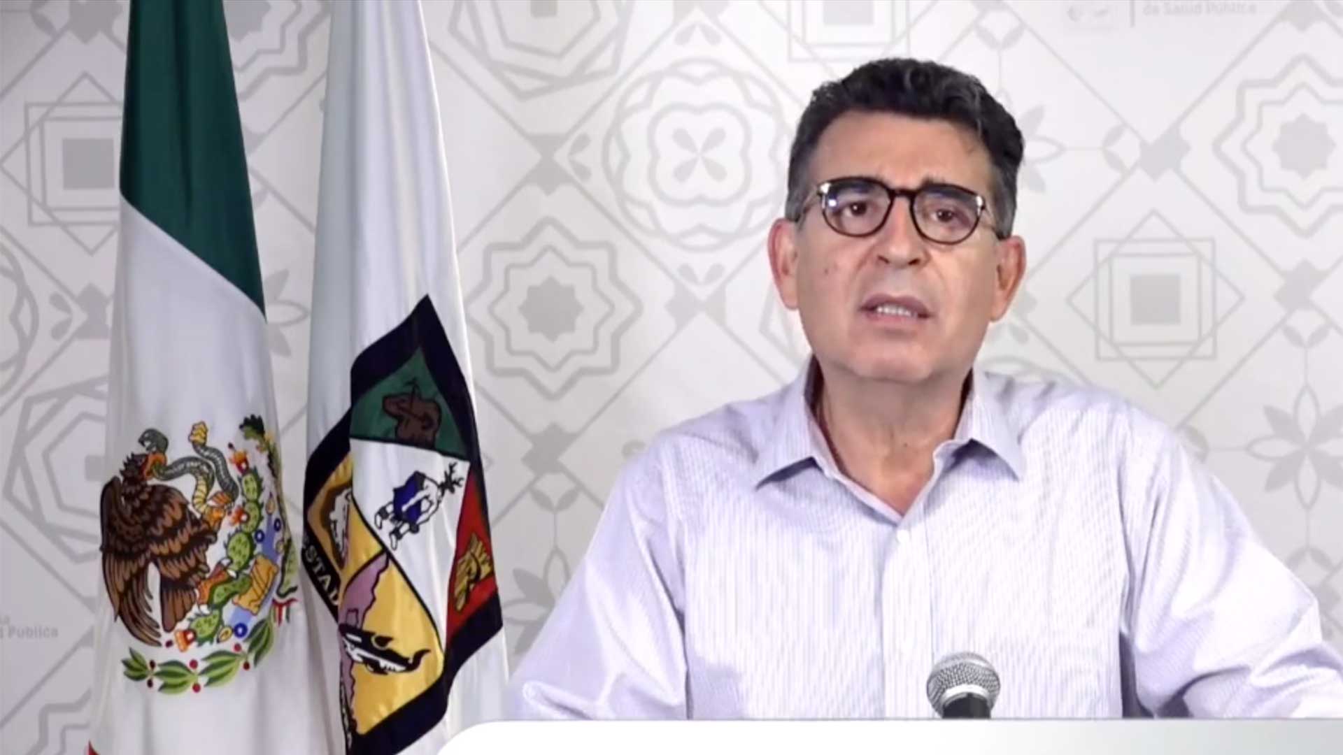 Sonoran Secretary of Public Health Enrique Clausen calls on residents to help avoid the further filling of hospitals in the state, in this still image from a June 29 video on the agency's Facebook page.