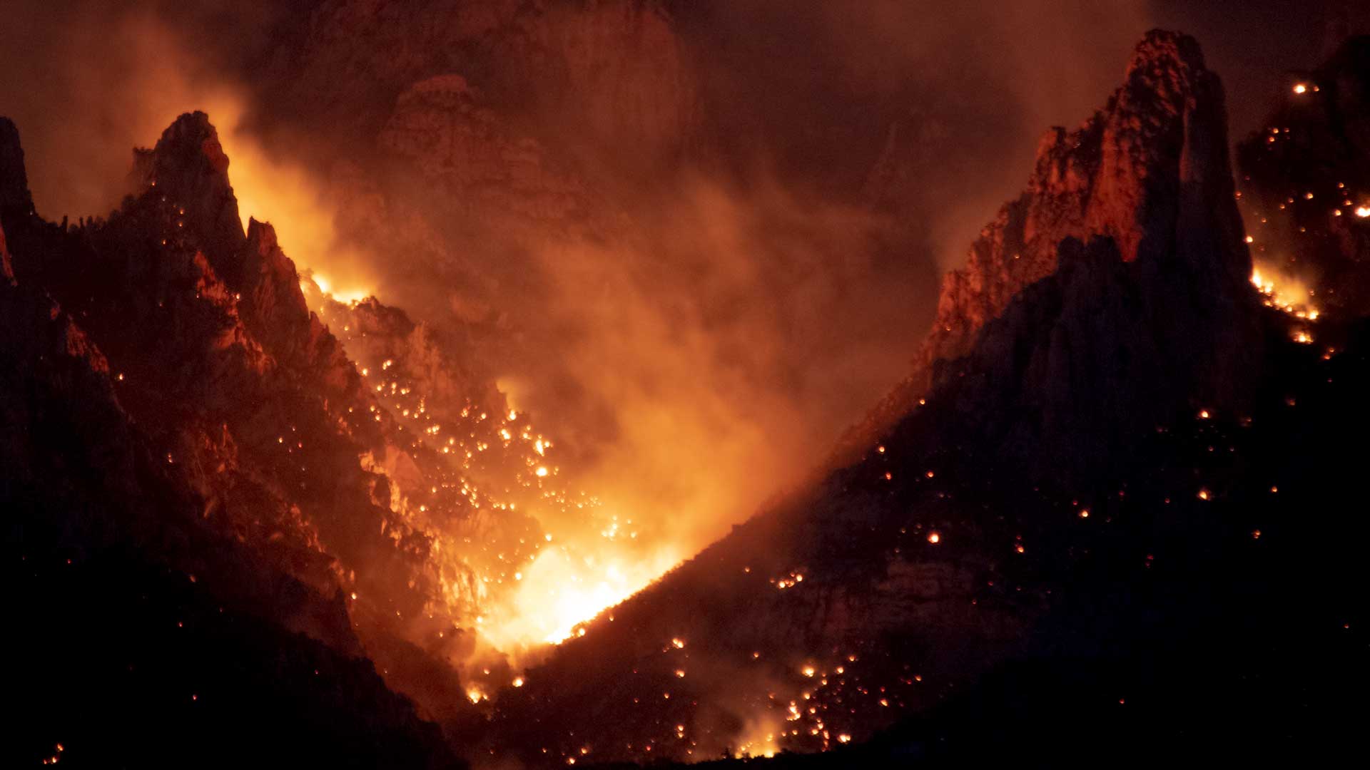 The Bighorn Fire burns in the Pusch Ridge Wilderness near Oro Valley on June 7, 2020.