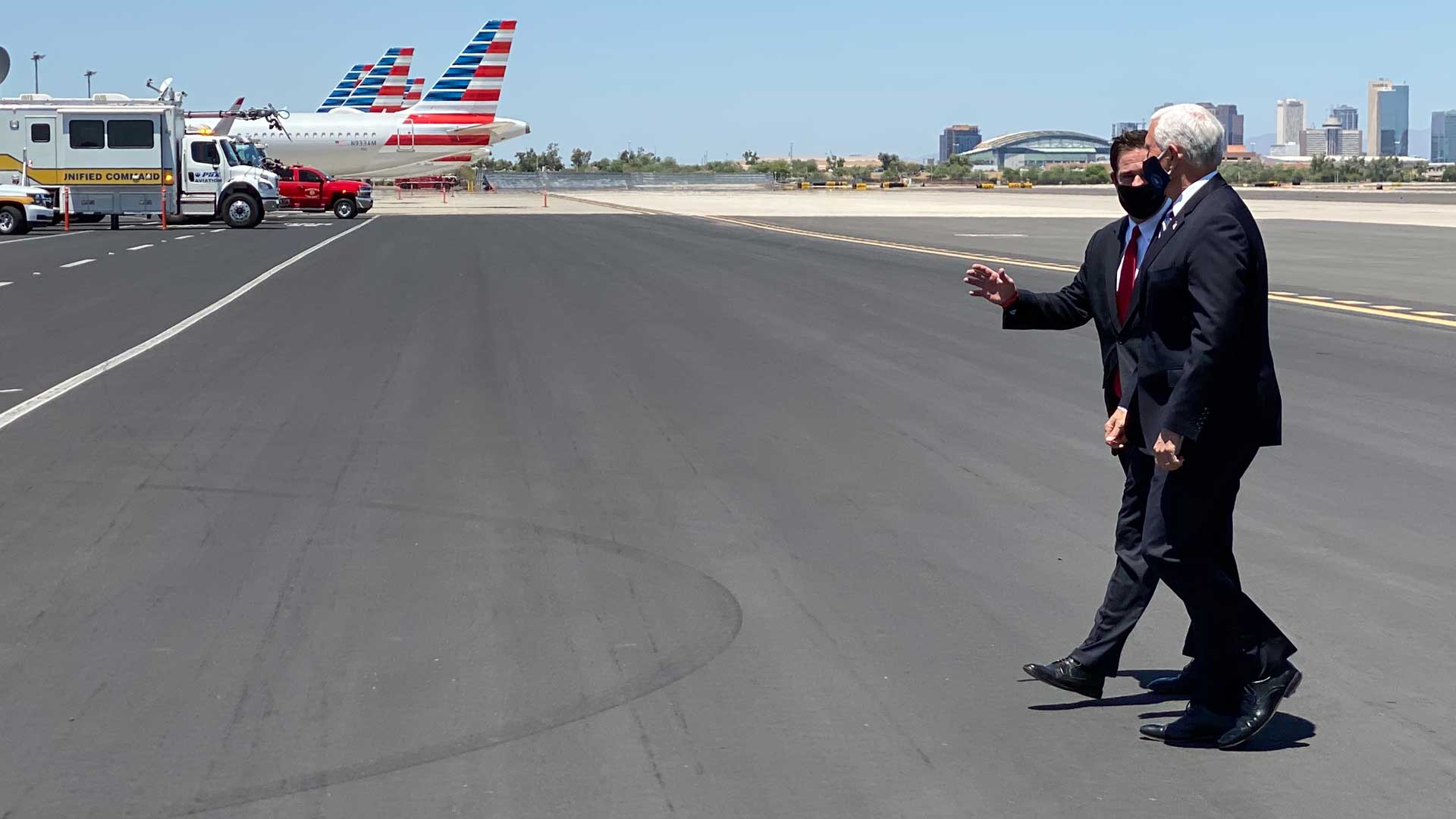 Gov. Doug Ducey greets Vice President Mike Pence on the tarmac in Phoenix.  Pence was in Arizona to discuss the state's response to the COVID-19 pandemic. July 1, 2020.