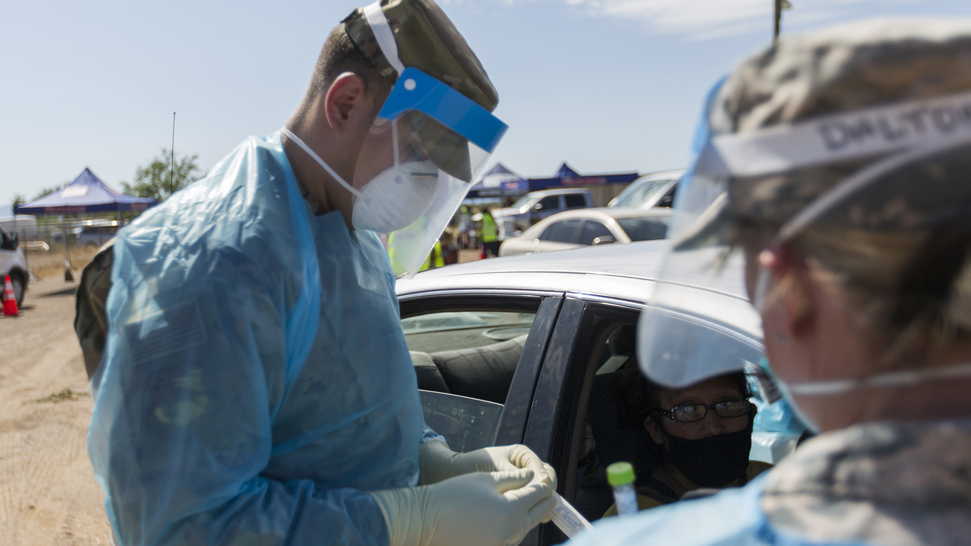 Arizona National Guard service members at a COVID-19 drive-thru testing site in the Tohono O'odham Nation in Sells, Arizona, July 6, 2020.