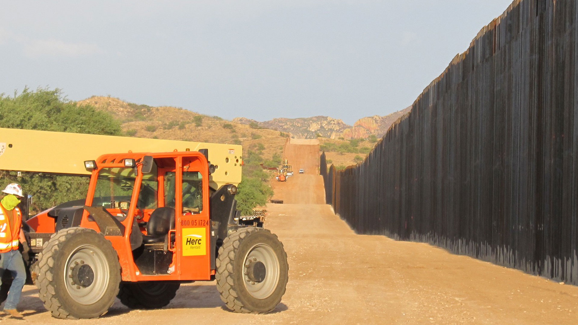 Construction of 30-foot high steel bollard wall on or near the Buenos Aires National Wildlife Refuge near Arivaca in July 2020.