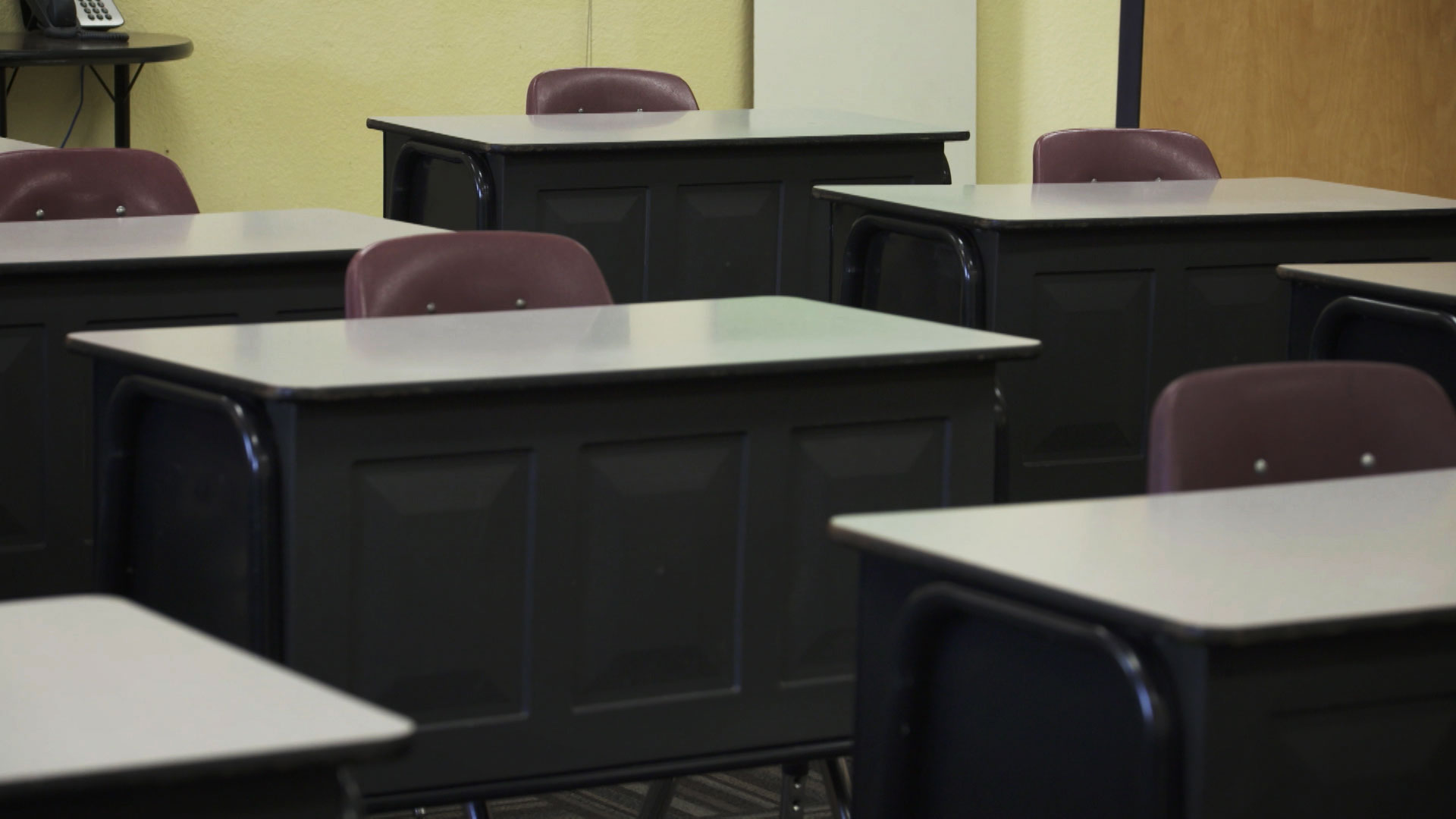 A row of empty desks inside a classroom at Mesquite Elementary on August 10, 2020. Students began the school year with at-home learning. 