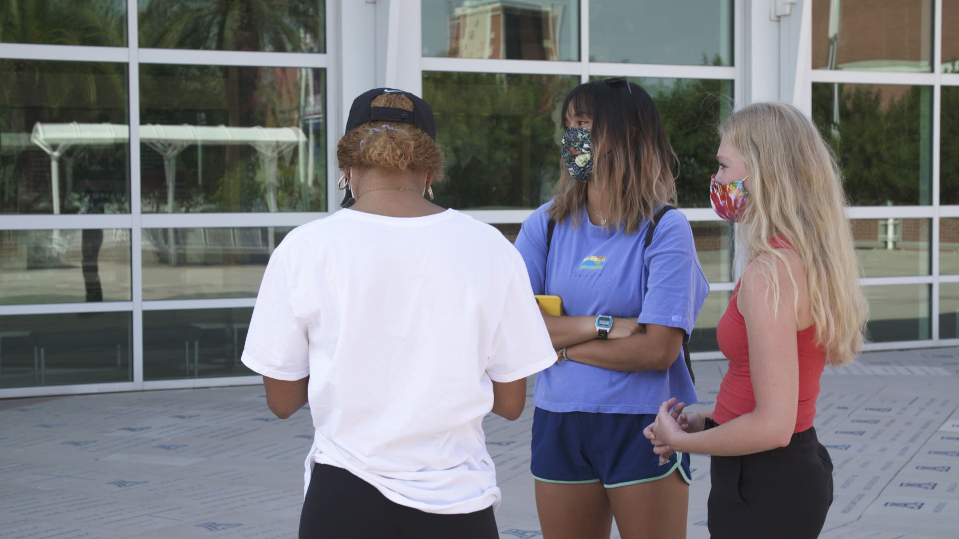 University of Arizona students wearing masks on campus.