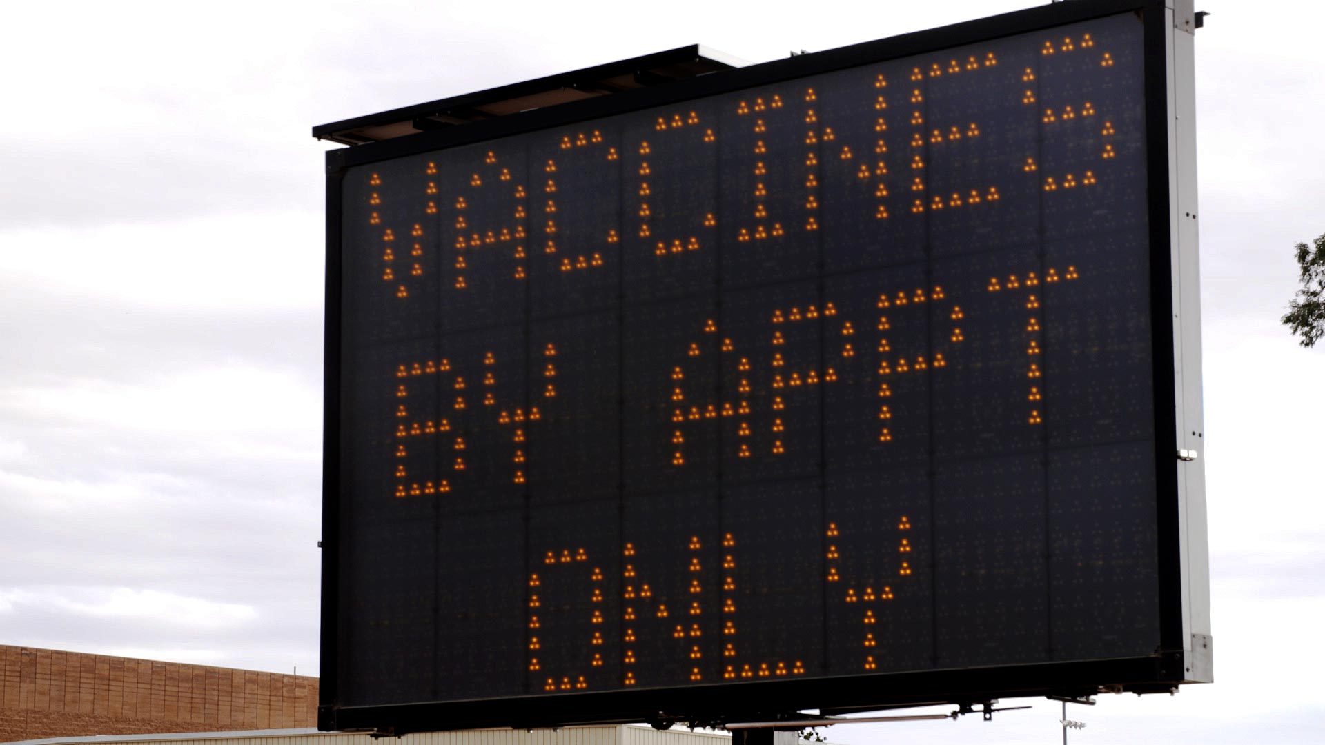 An electronic sign notifies the public that appointments are required to receive a COVID-19 vaccine at one of Pima County's vaccination sites. January 2021. 