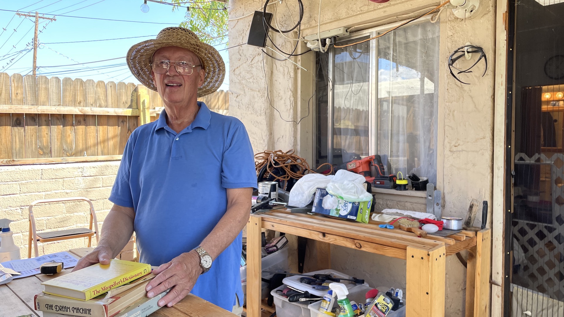 Peter Norbeck, 79, stands in front of his casita and woodworking desk on October 1st, 2021. 