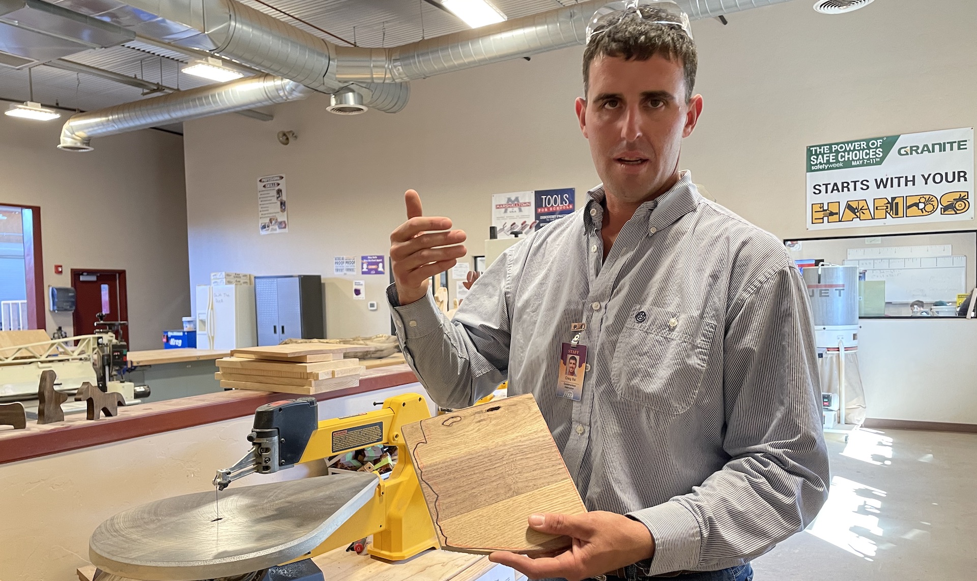 Craig Bal teaches at a Pima County construction training program. He says his students start with knick knacks, like this wooden figure of Arizona. October 26th, 2021. 