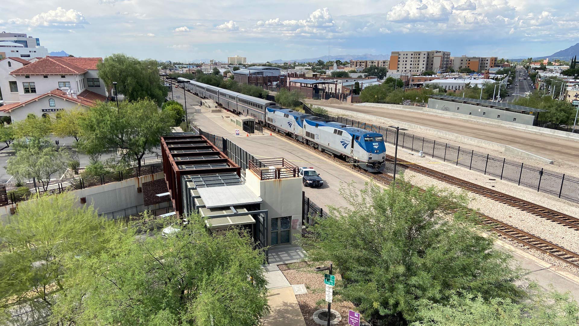 Police say a U.S. Drug Enforcement Administration special agent and another person were killed during a shootout on an Amtrak train that stopped in downtown Tucson on Monday morning.