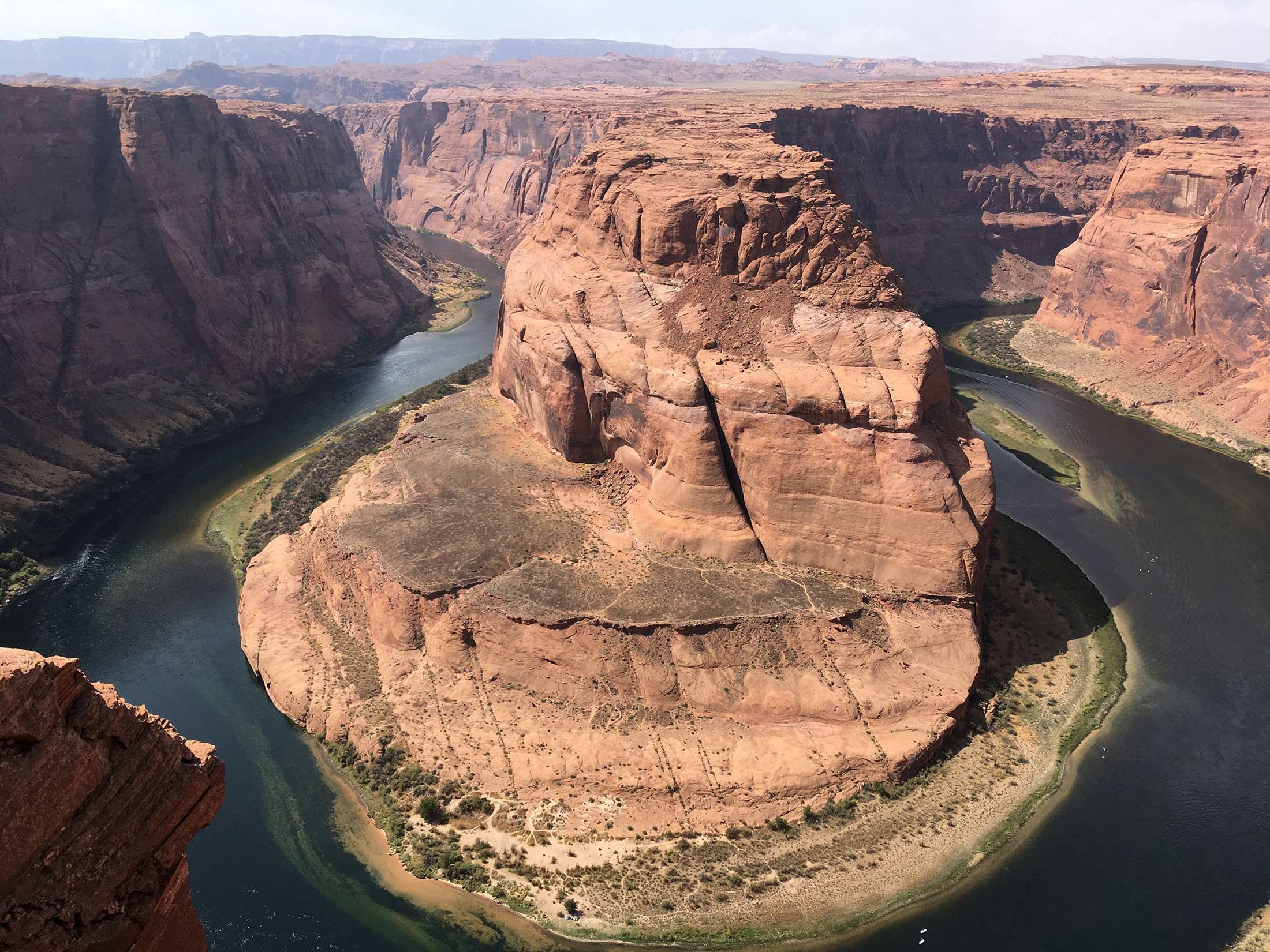 Heat is creating cycles that contribute to drought, drying out soil, and melting snow more quickly. That leaves less water in the Colorado River, seen here near Page, Ariz.
