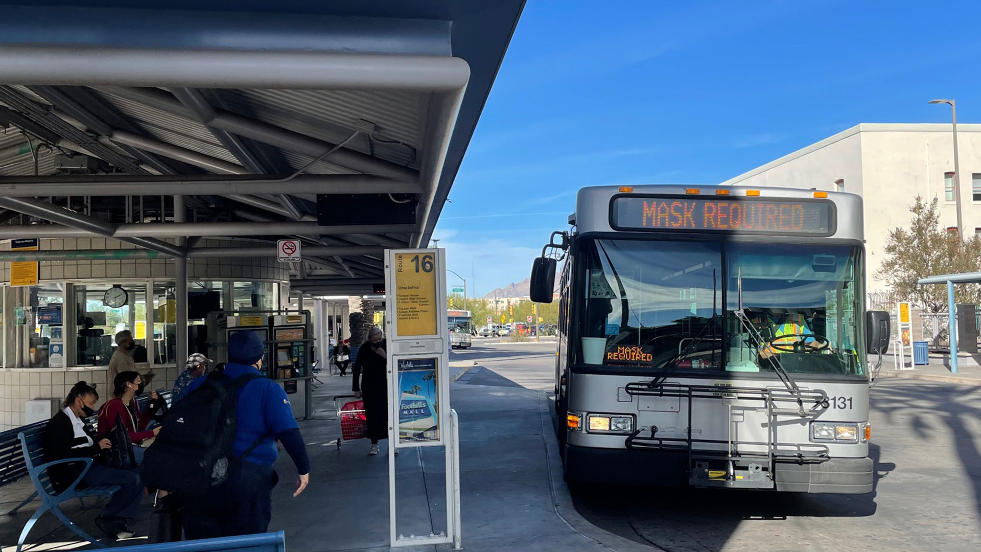 Passengers wait to board a bus at the Ronstadt Transit Center in downtown Tucson. Rides have been free since March 2020. 