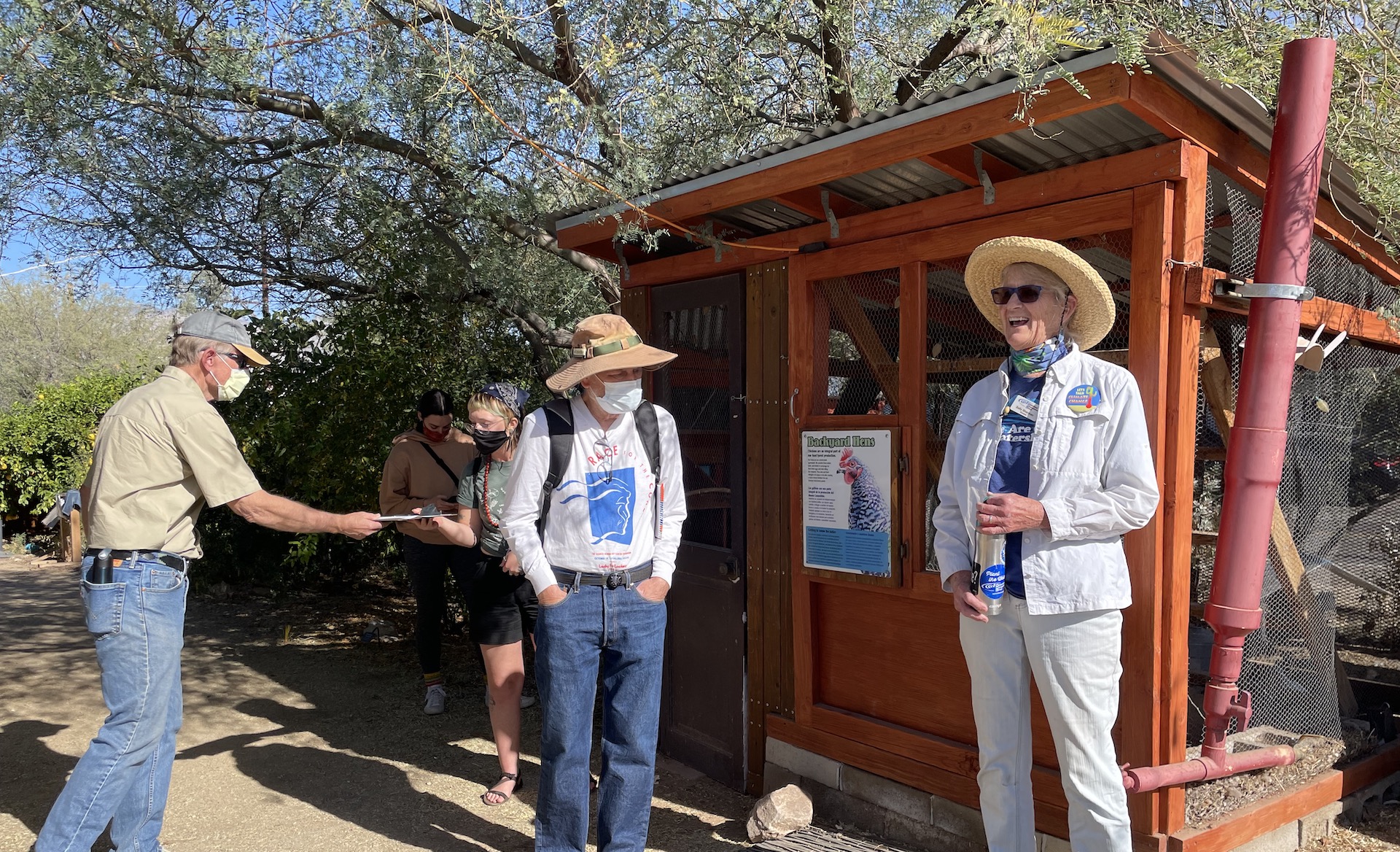 Docent Sally Sherman gives a tour of the Watershed Management Group's Living Lab on December 4th, 2021. The tour shows participants how to conserve water through rainwater harvesting and other means. 