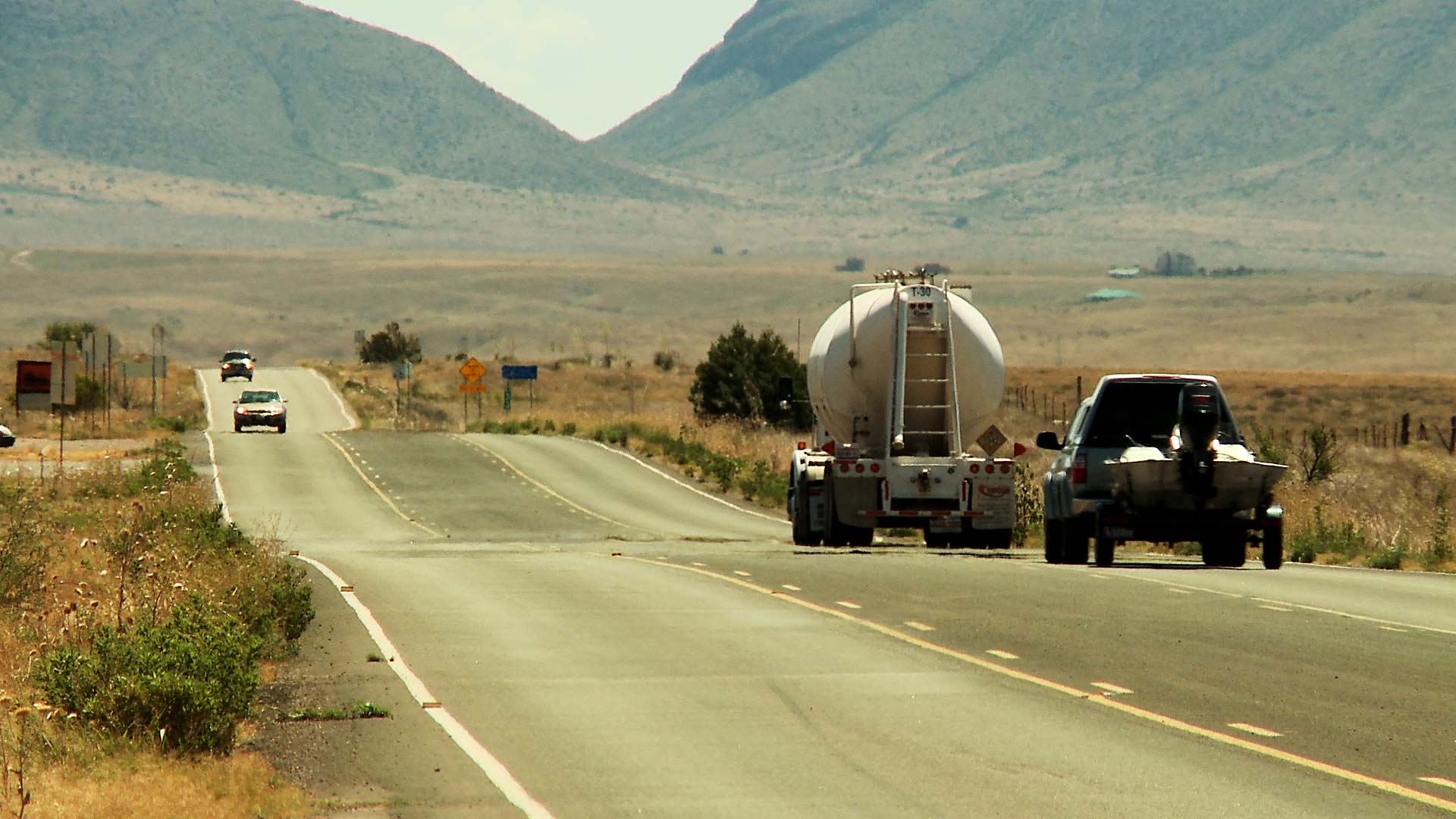 Vehicles travel along a highway near Sonoita, Ariz. 