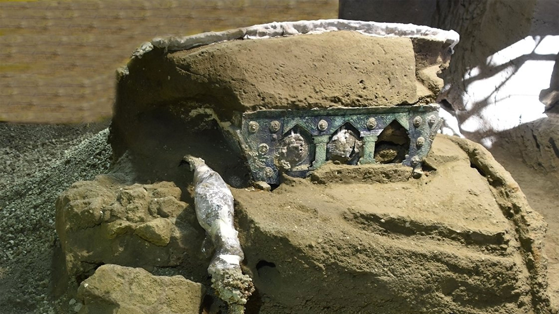 A well-preserved chariot discovered in Pompeii has been described as an "extraordinary find" and has iron wheels, bronze and tin decorations and mineralized wood.