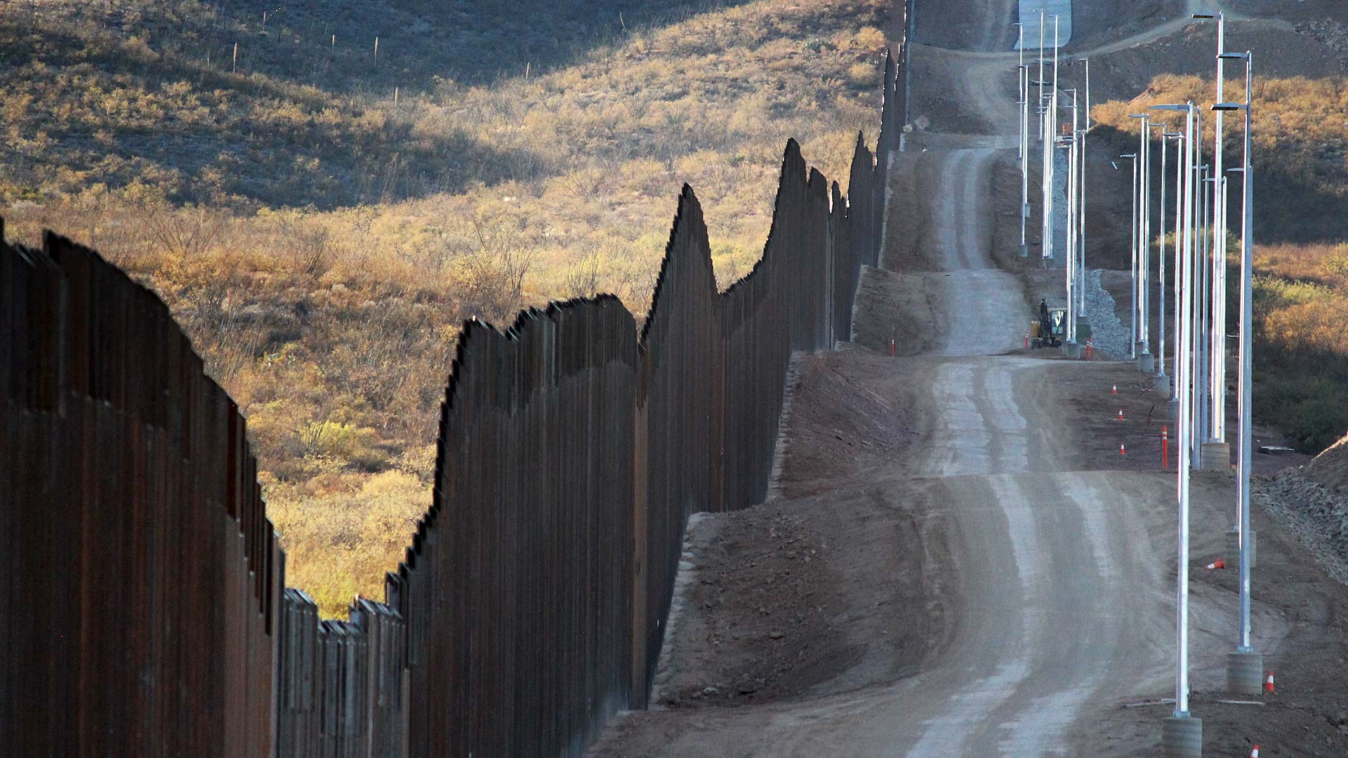 A stretch of border fencing east of Douglas constructed as part of President Trump's initiative to erect a taller wall along the southern border. November 2020. 