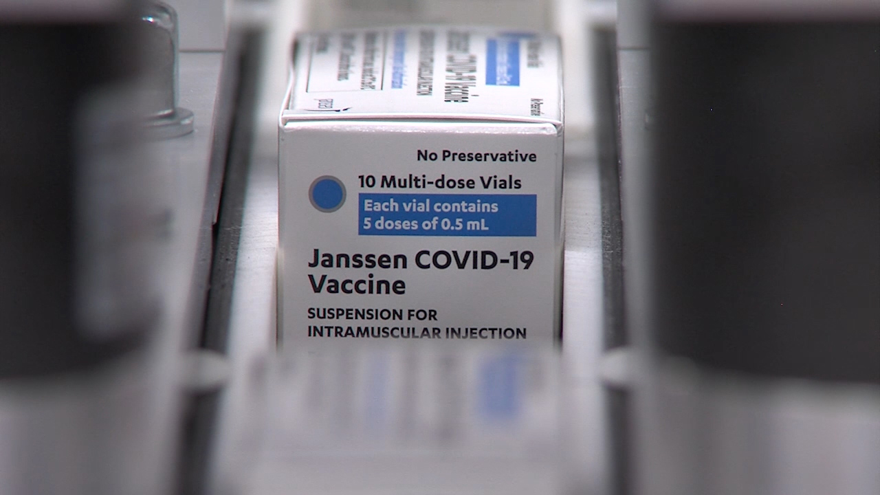 A box holds vails of Johnson & Johnson's Janssen COVID-19 vaccine at the company's manufacturing facility. 