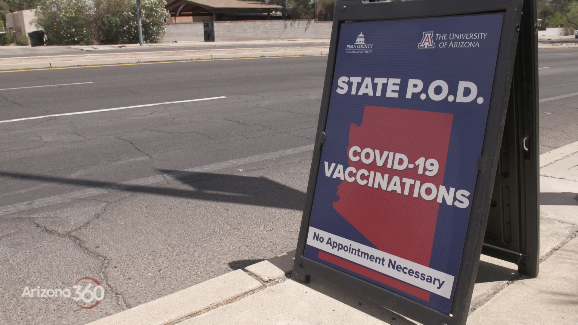 Sign advertising COVID-19 state vaccination pod at the University of Arizona. 