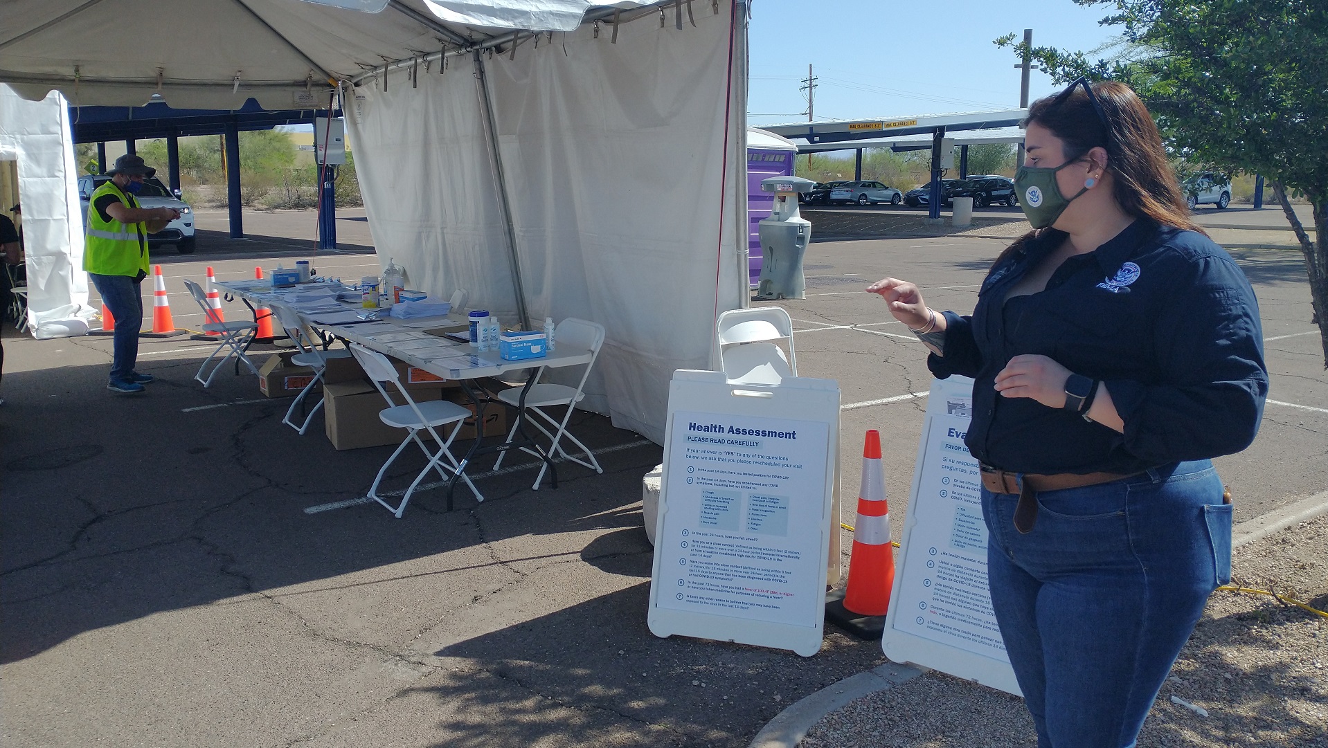 FEMA Operations Section Chief Mellisa Boudrye explains the workings of the registration area of a vaccination site managed by her agency at Pima Community College on May 3, 2021.