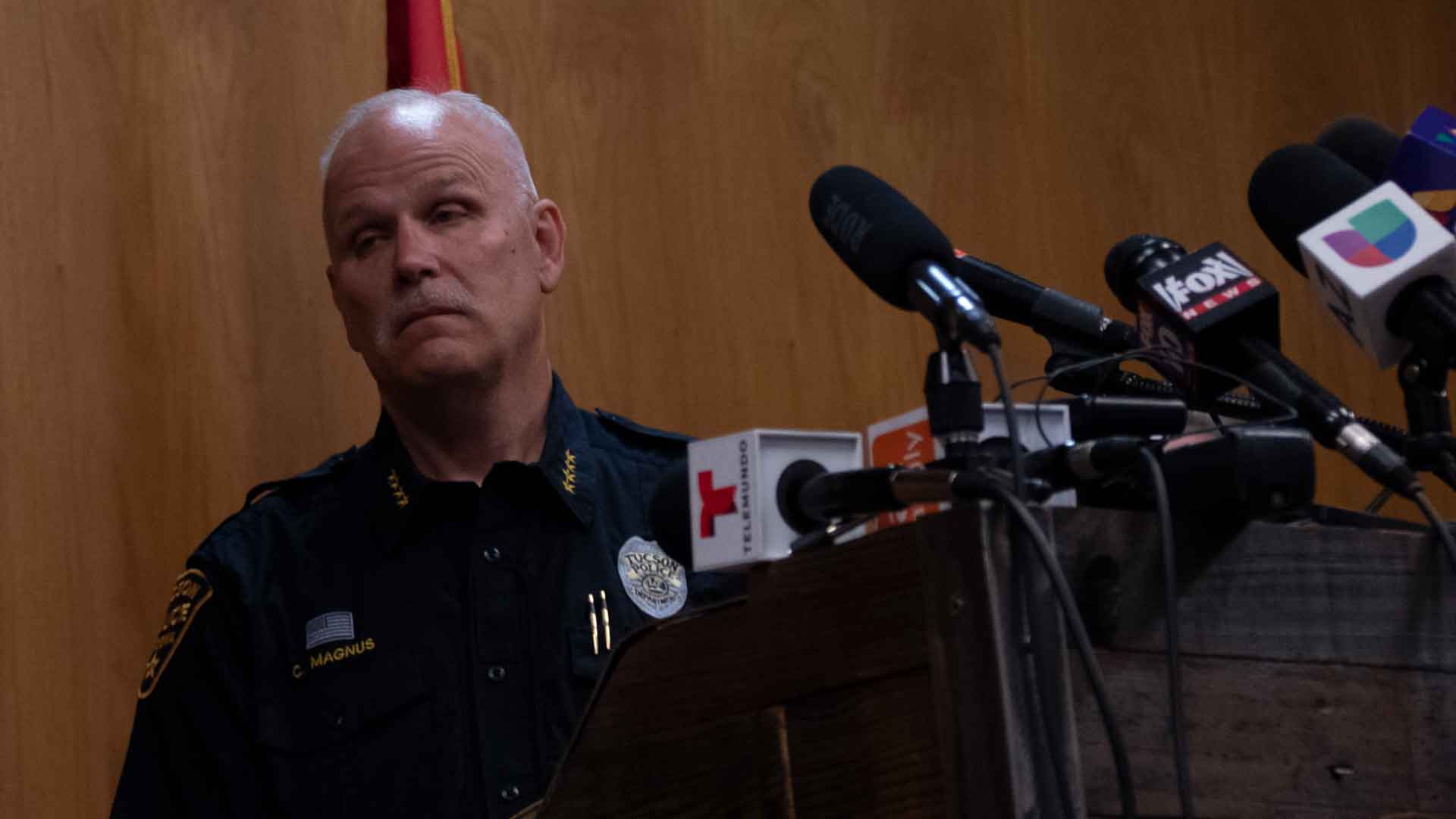 Tucson Police Chief Chris Magnus watches body camera video from a TPD officer who shot a suspect accused of shooting multiple people on Sunday, July 19, 2021.