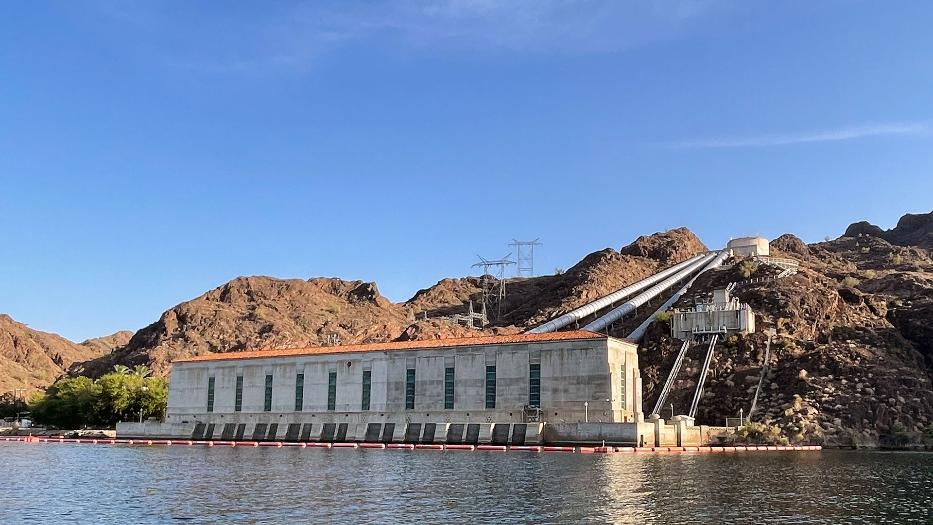 Whitset Pump House on the California side of Lake Havasu. Lake Havasu reservoir is formed by Parker Dam on the Colorado River, on the border between San Bernardino County, California and La Paz County, Arizona. The Whitsett Intake Pumping Plant is at the beginning of the Colorado River Aqueduct, a 242-mile aqueduct, which transports water from Lake Havasu to Lake Mathews in Riverside County.