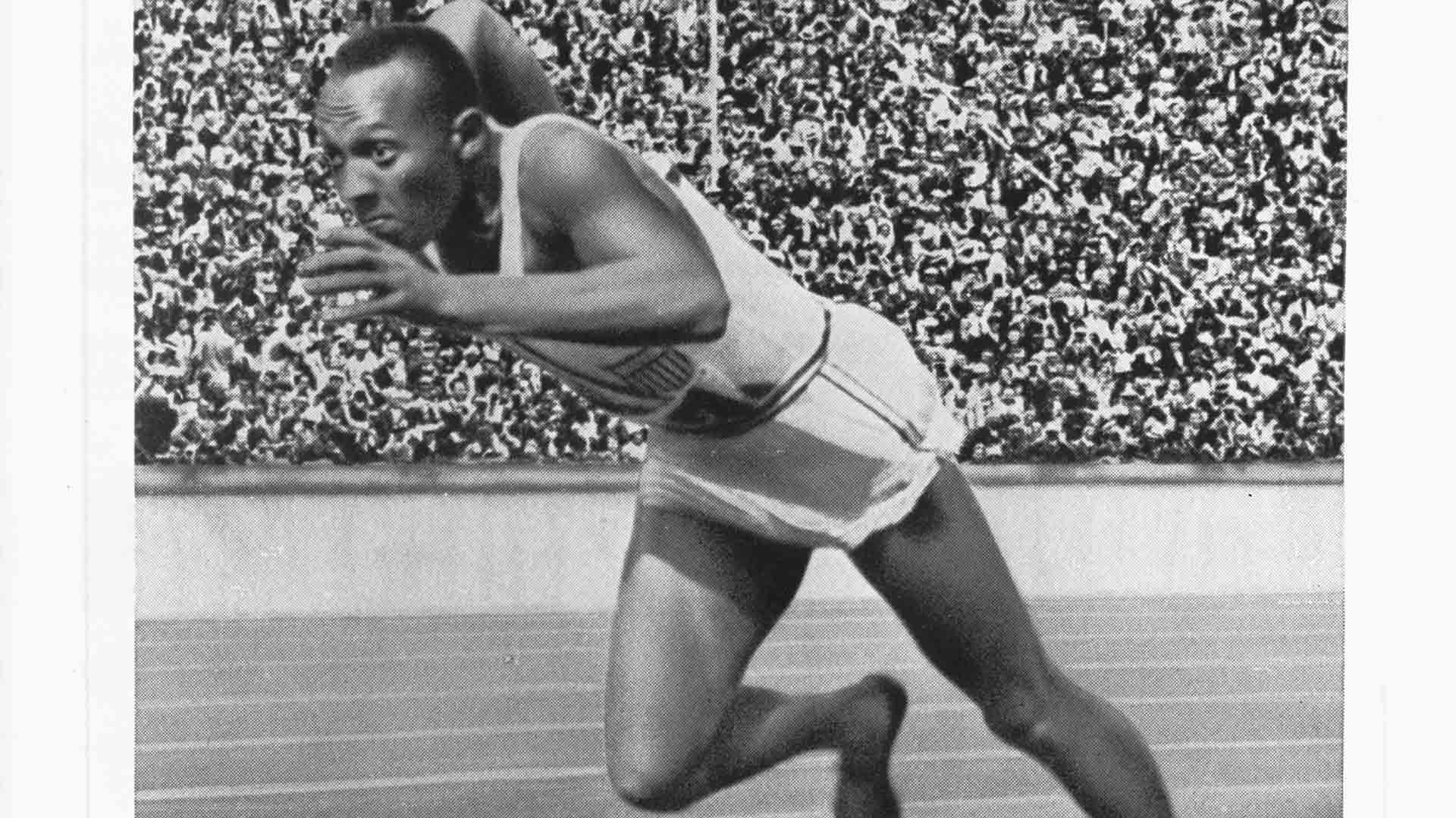 Jesse Owens at start of record-breaking 200-meter race, 1936.