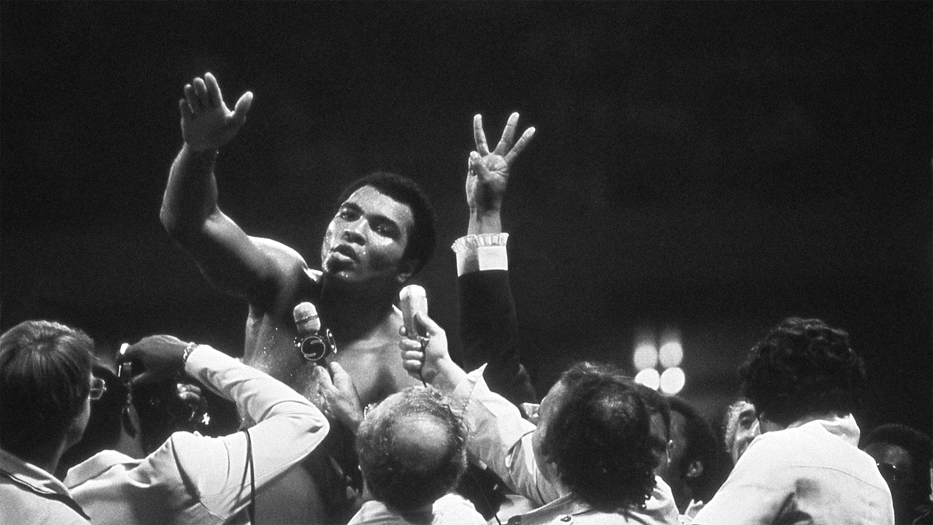 Muhammad Ali talks with the press after winning back the Heavyweight Championship for an unprecedented third time by beating Leon Spinks at the Super Dome in New Orleans, LA. September 15, 1978.