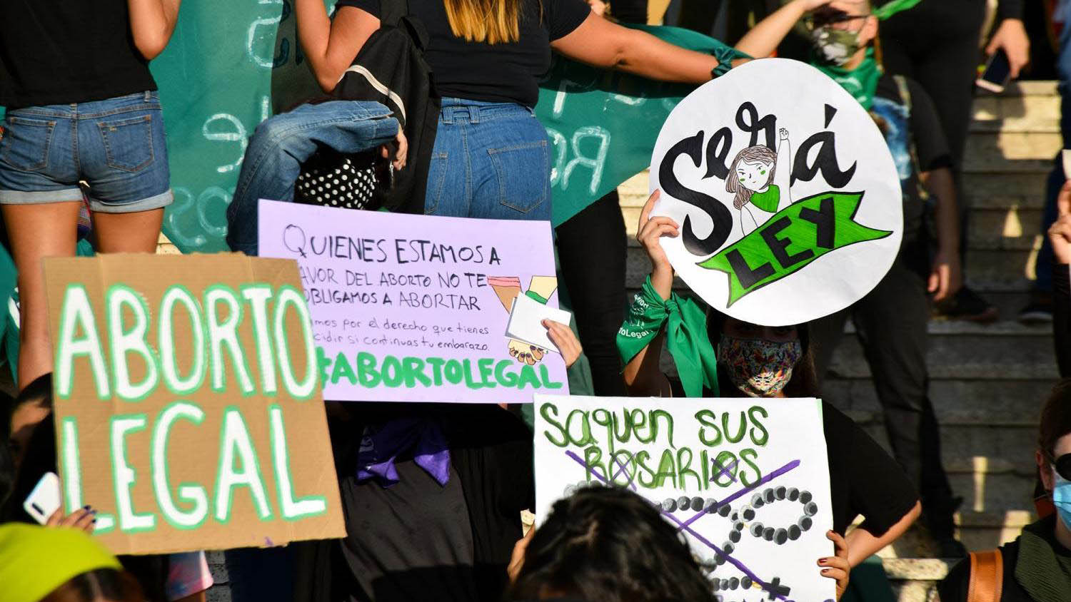 Protesters hold up signs supporting the right to abortion in Hermosillo, Sonora during a march on Sept. 28, 2020.