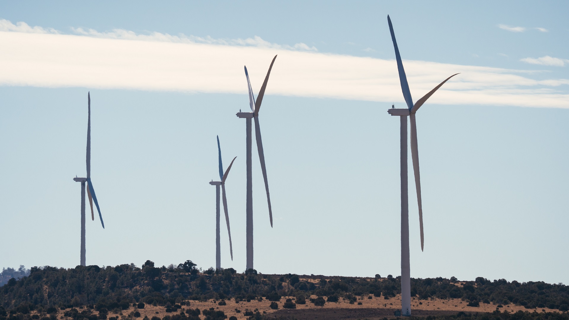 This photo distributed by NextEra Energy Resources shows the 100-megwatt Borderlands Wind Project, which entered service in late 2021.  Its 34 turbines will provide enough energy for Tucson Electric Power to supply 26,000 average homes.