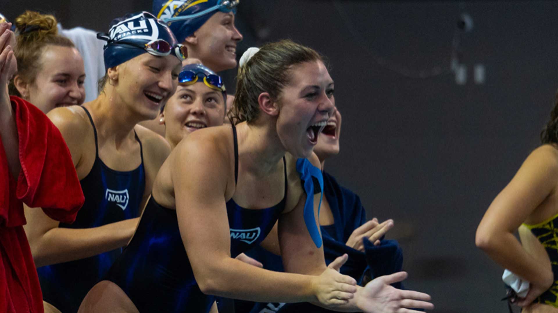 Northern Arizona swimmer Emma Warner continues to inspire teammates as she battles papillary thyroid cancer. 