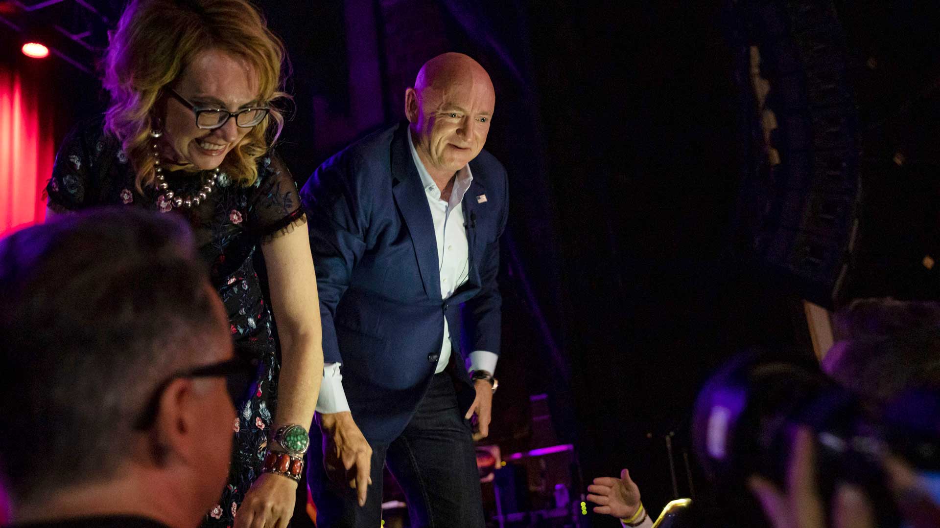 Sen. Mark Kelly, D-Ariz., with his wife former Rep. Gabrielle Giffords greets supporters at an election night event in Tucson, Ariz., Tuesday, Nov. 8, 2022.