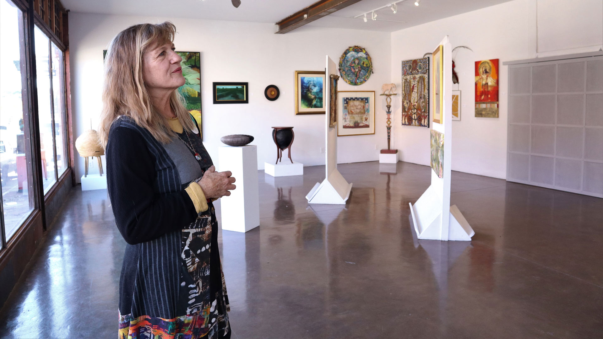 Sharon Stetter, co-chair of the Bisbee Arts Commission showcases an exhibit of 130 local artists. November 2022