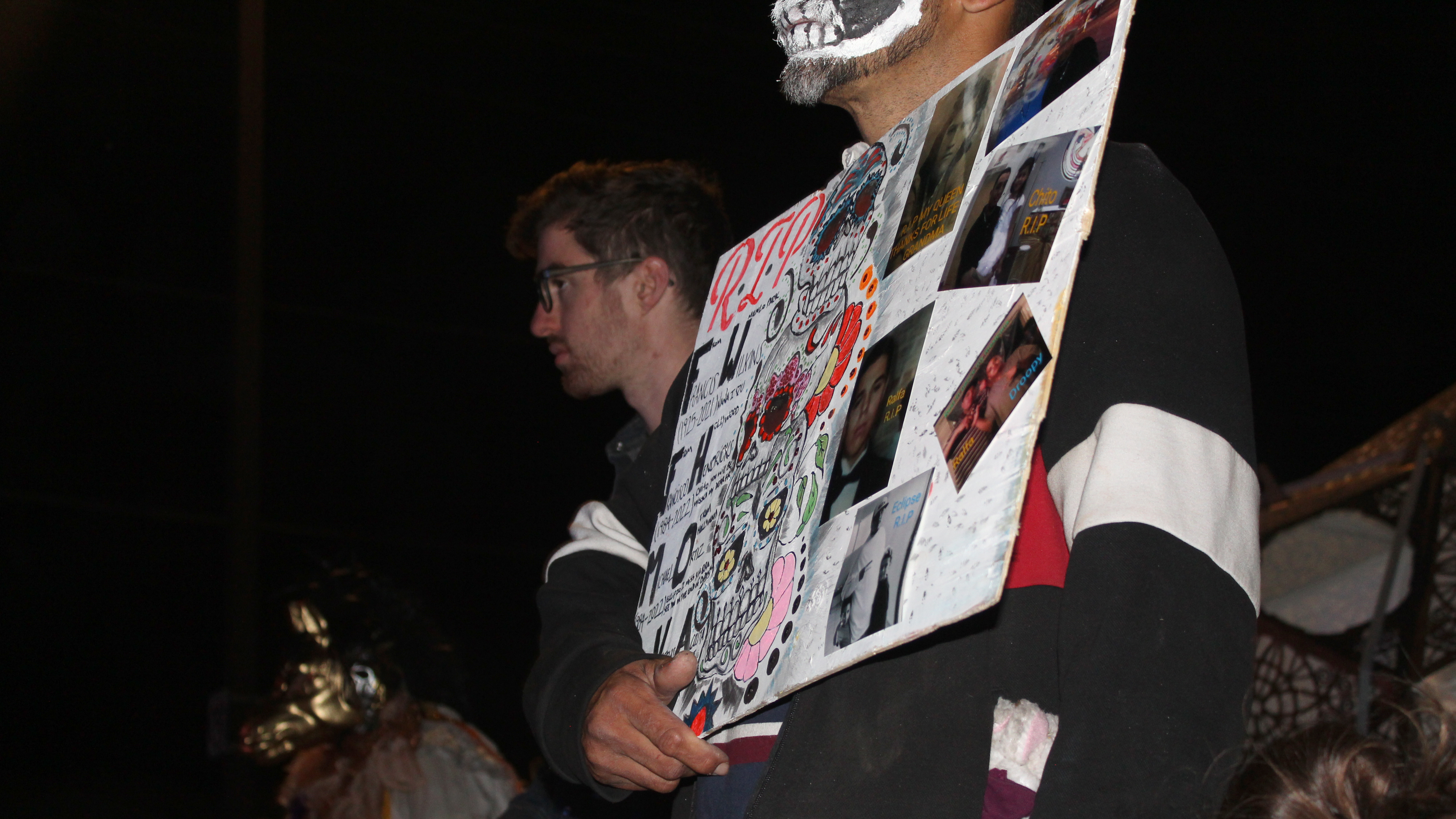 Many attendees made posters with pictures of their loved ones who passed away. 