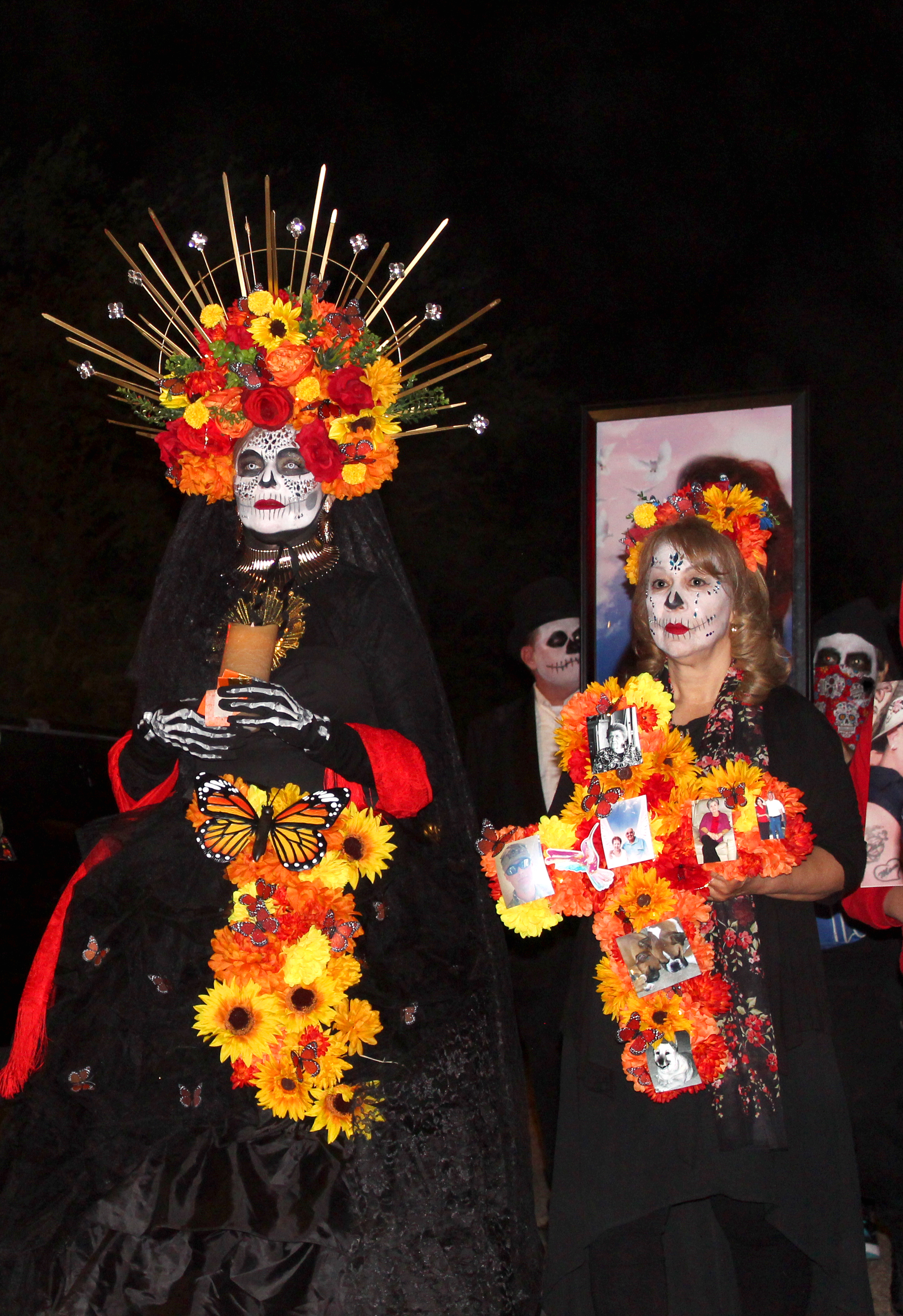 Attendees dressed up as calaveras as they walk the streets to remember loved ones.