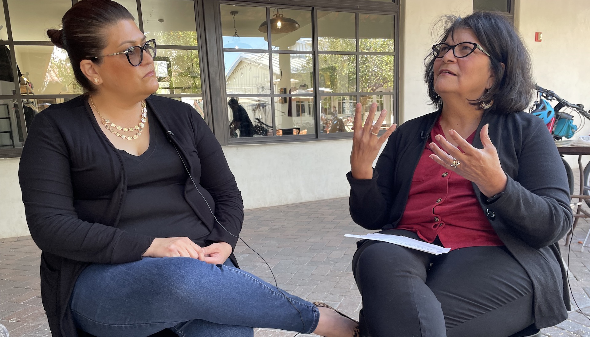 Olga Flores and her mother Betty Villegas have a conversation about their time working in housing at the Mercado San Agustin. 