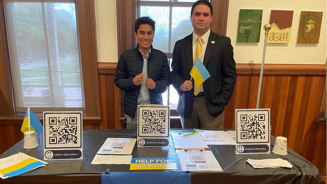 Ron DeSouza and United Nations Regional Representative John Dalton show support for Ukraine at a peace rally at The University of Arizona held on March 29, 2022