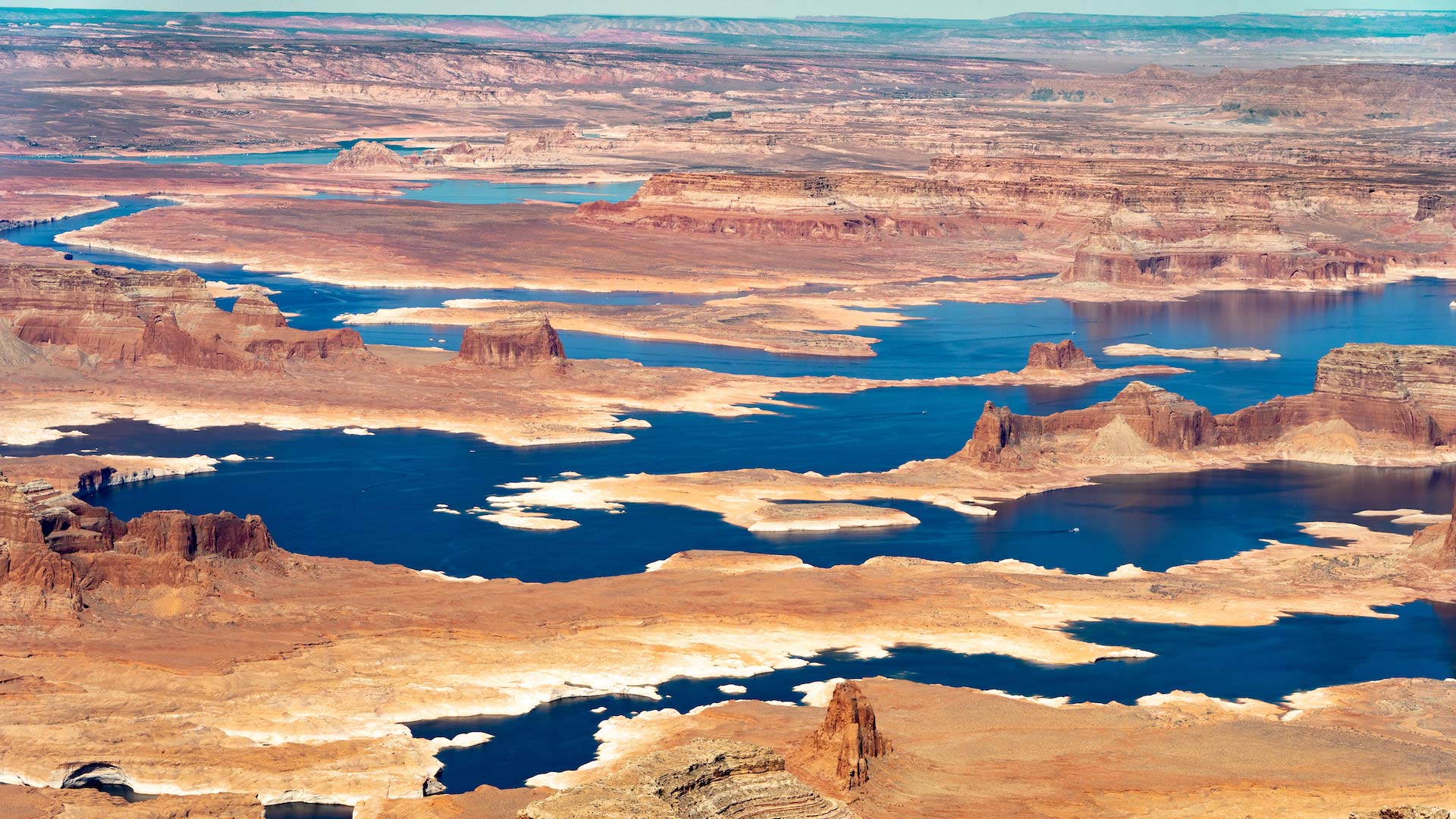 Water levels in Lake Powell, seen here in May 2021, are dipping dangerously low. The federal government has proposed an unprecedented plan to cut back on water supplies for Arizona, Nevada and California. The measure aims to keep water levels high enough to generate hydropower at the Glen Canyon Dam.