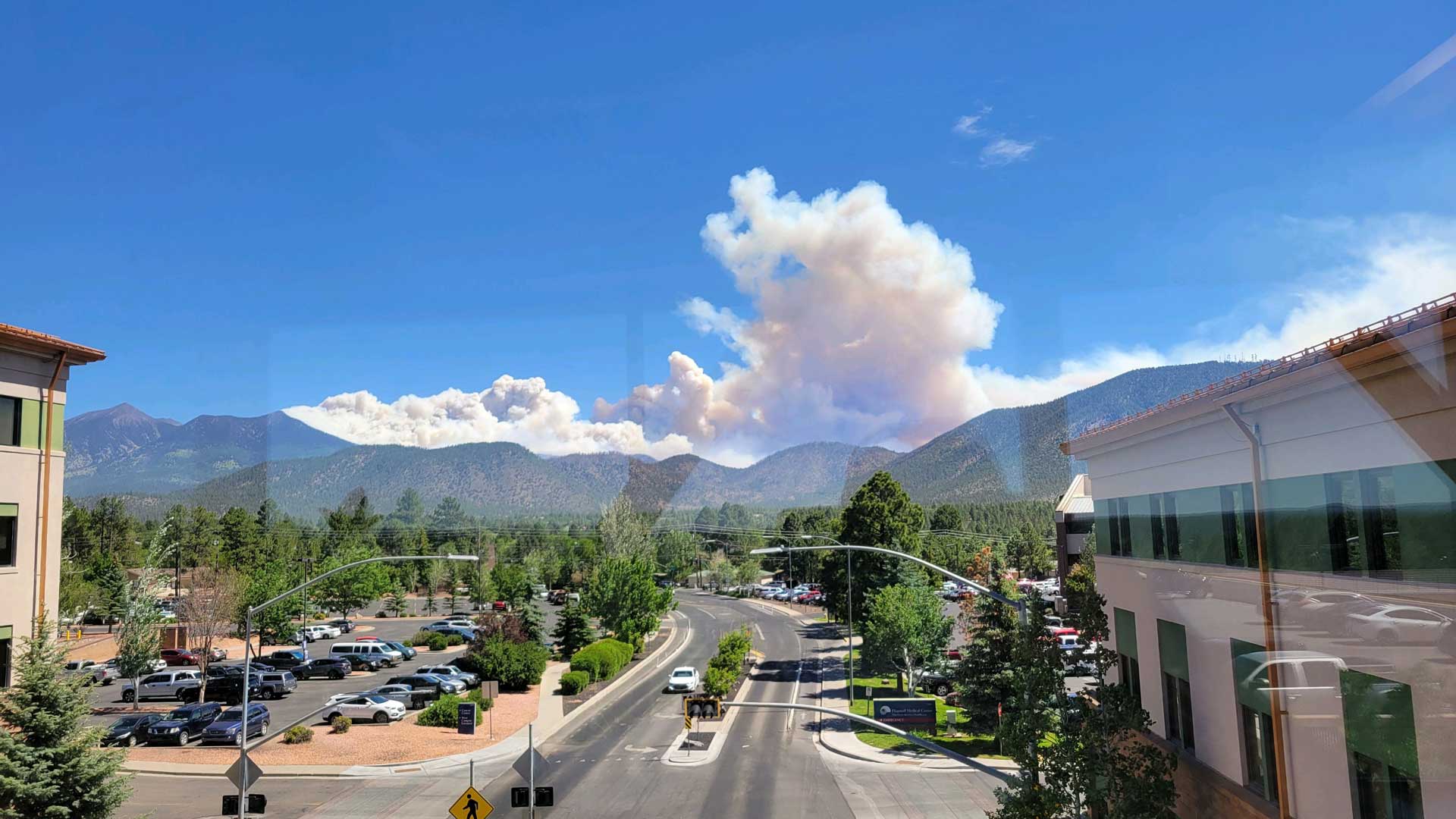 Smoke from wildfires in Flagstaff billows over the San Francisco mountains. June 13, 2022