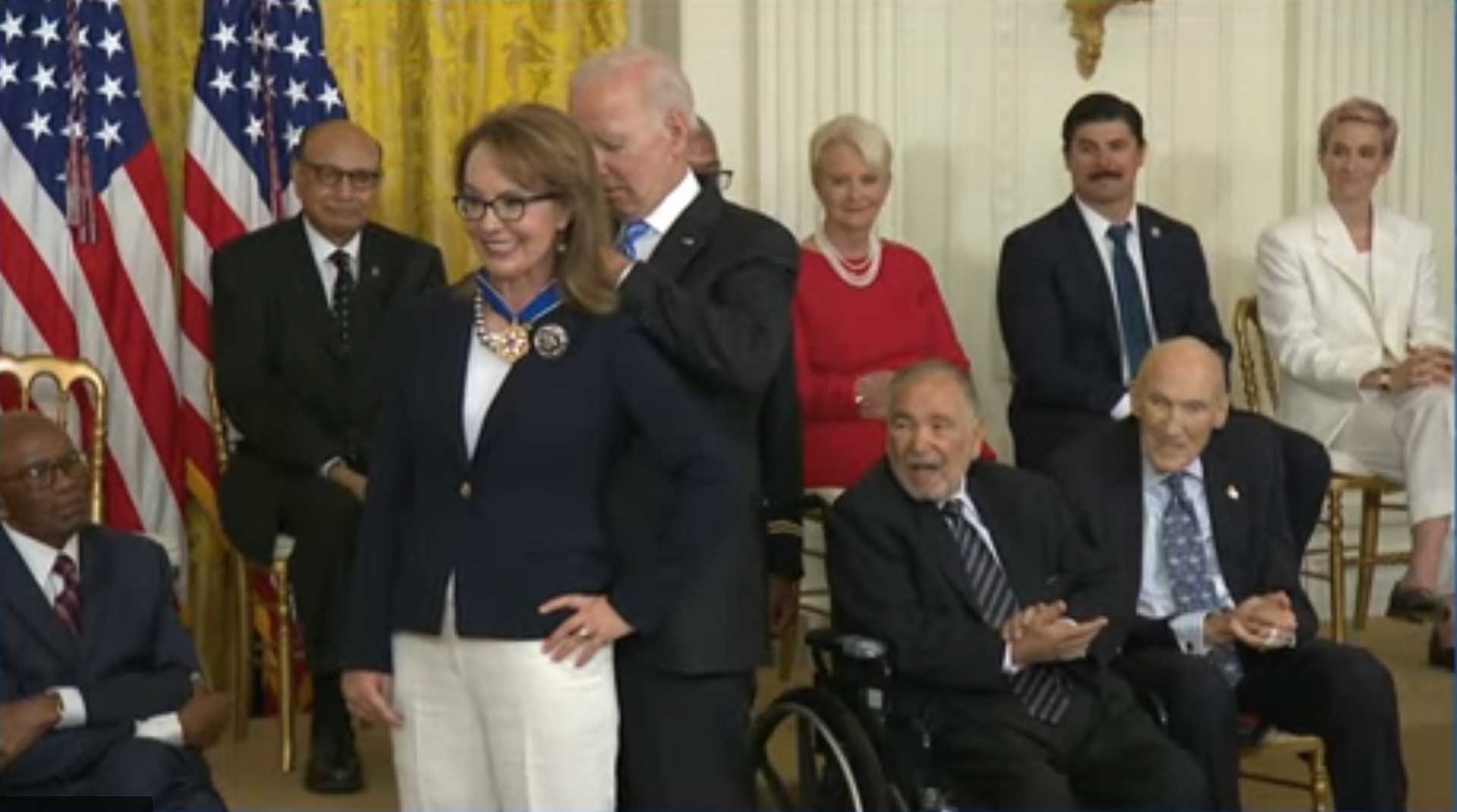 President Joe Biden awards Gabrielle Giffords the Presidential Medal of Freedom at the White House. July 7, 2022