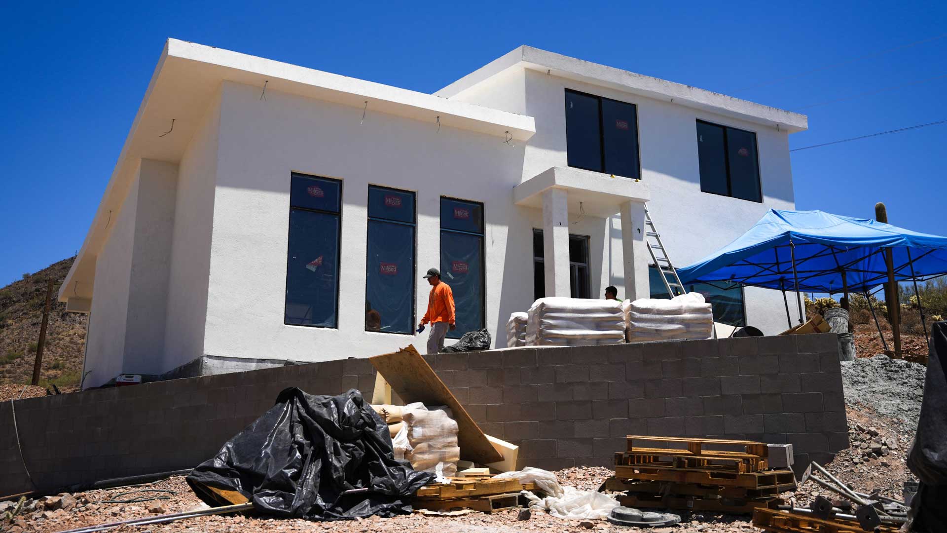 Kenneth Skinner’s house sits on a hillside in north Phoenix on July 1, 2022. The home is constructed with expanded polystyrene foam and Sabscrete, a concrete mix developed by Strata International Group. 