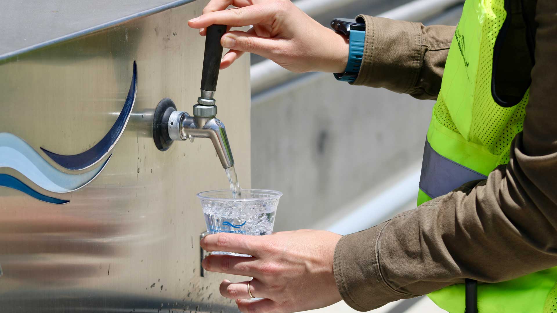 Michelle Peters fills a glass with freshly desalinated ocean water at Poseidon Water's Carlsbad plant. Using reverse osmosis, the facility creates about 10% of San Diego County's freshwater supply.
