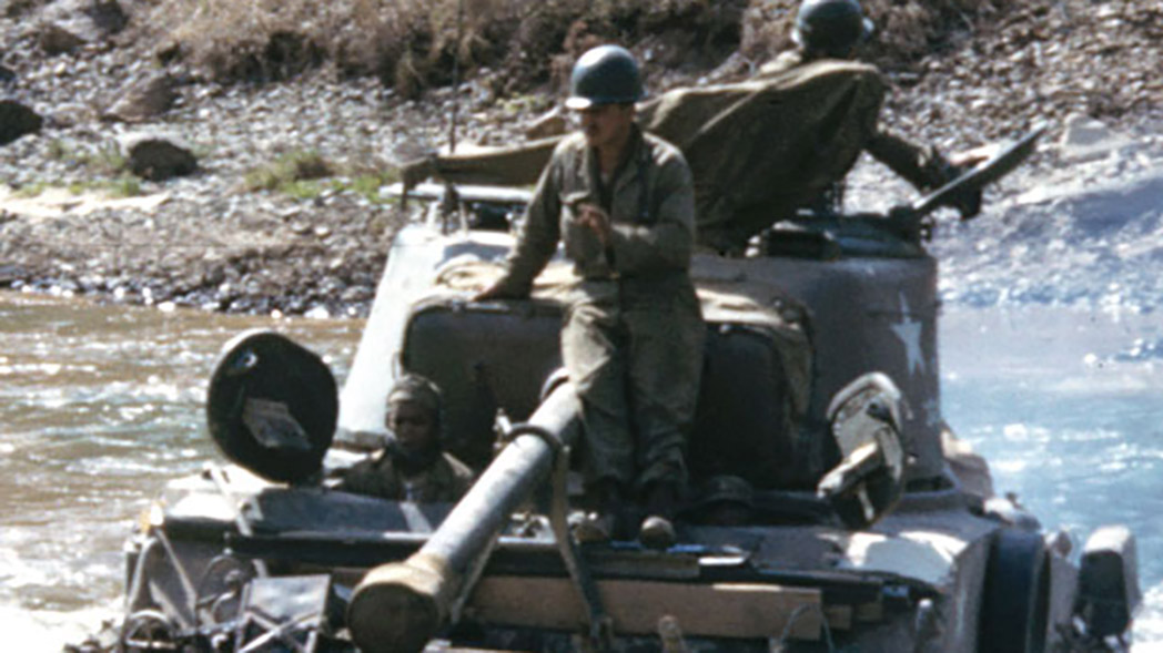 Spencer Titley photo of tank in river during Korean War